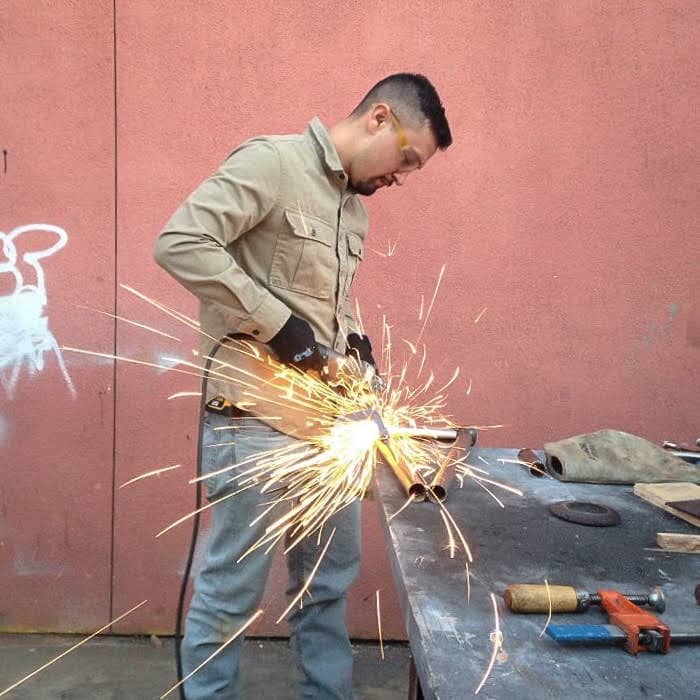 a person using a circular saw