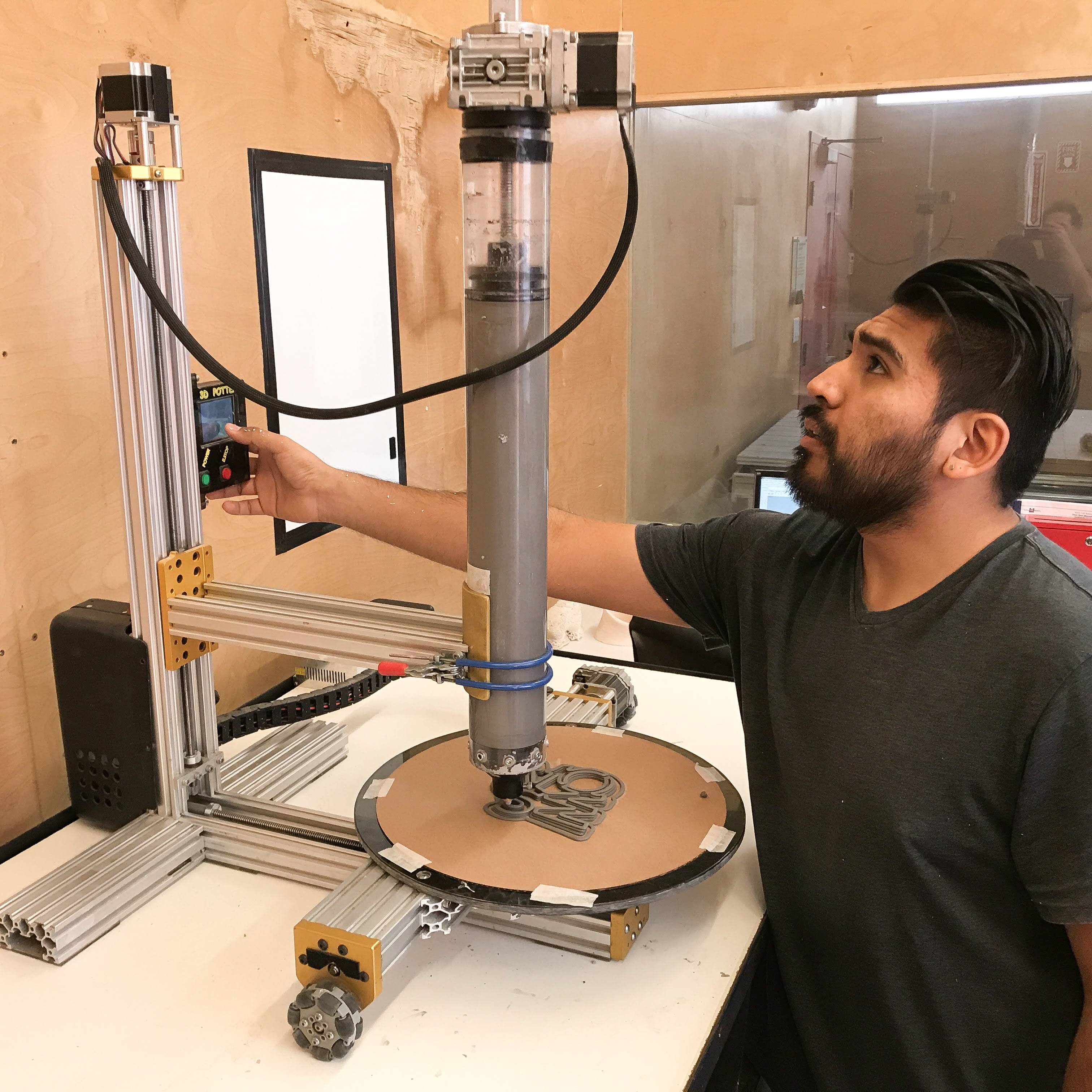 a person standing next to a machine