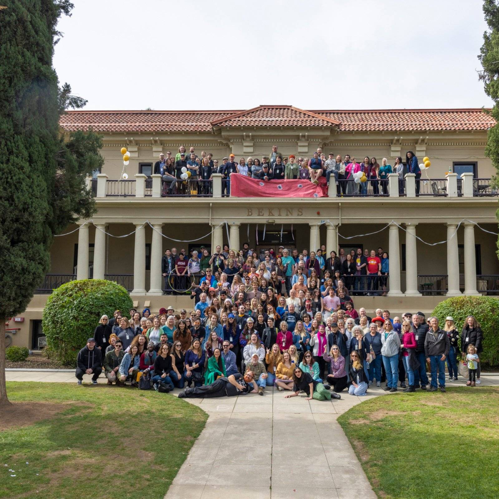 a group of people posing for a photo