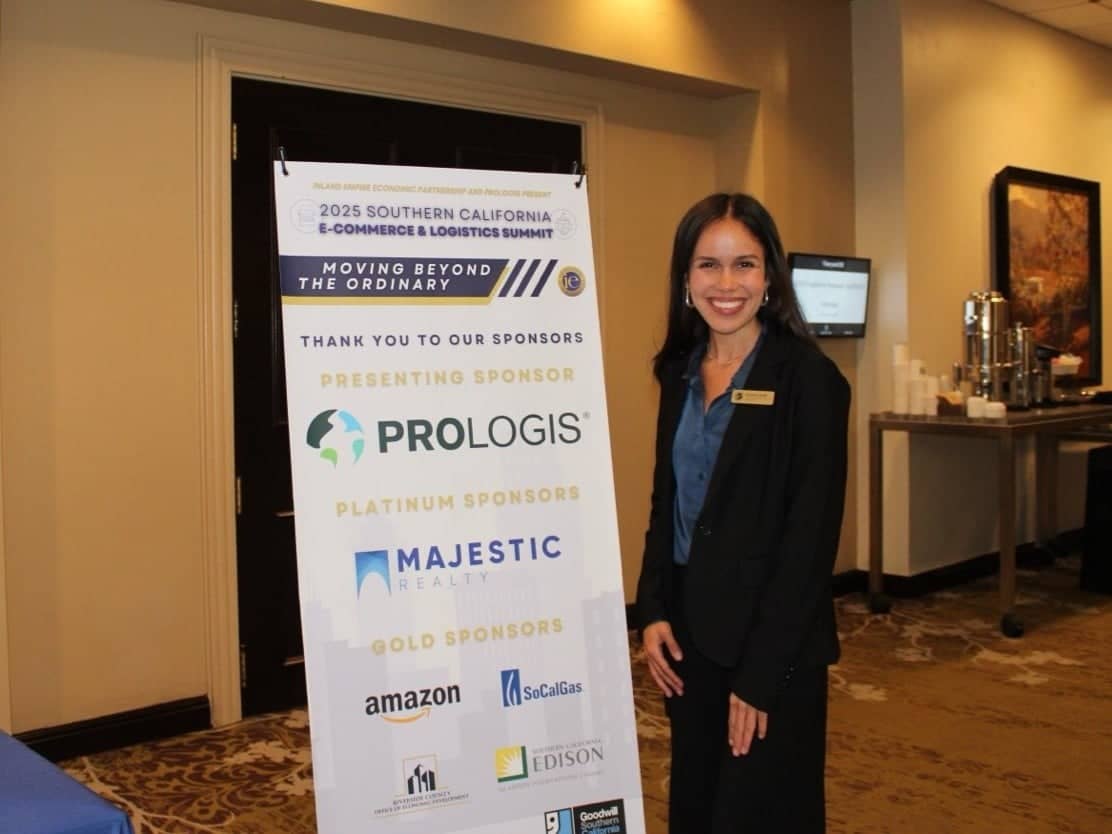 a person standing next to a sign