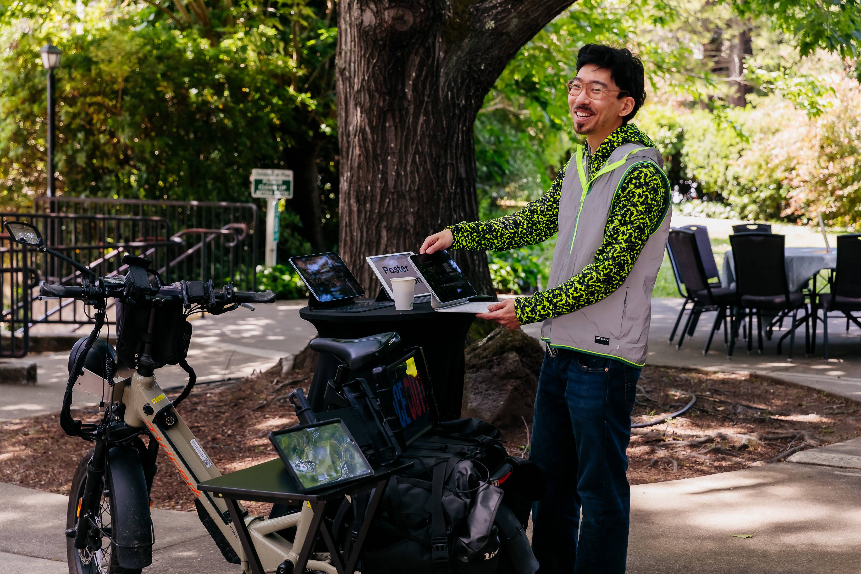 a person standing next to a bicycle
