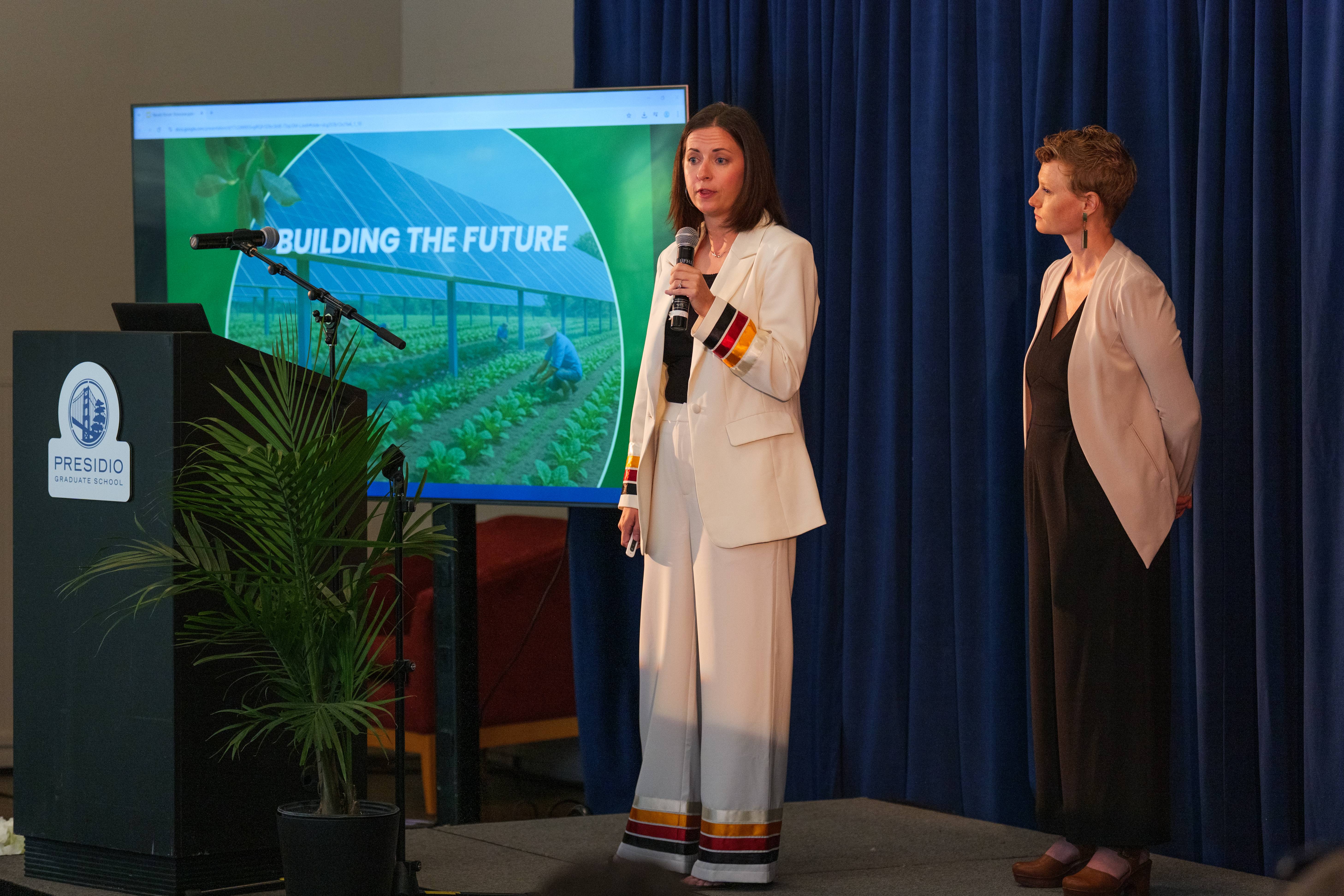 a person standing in front of a screen