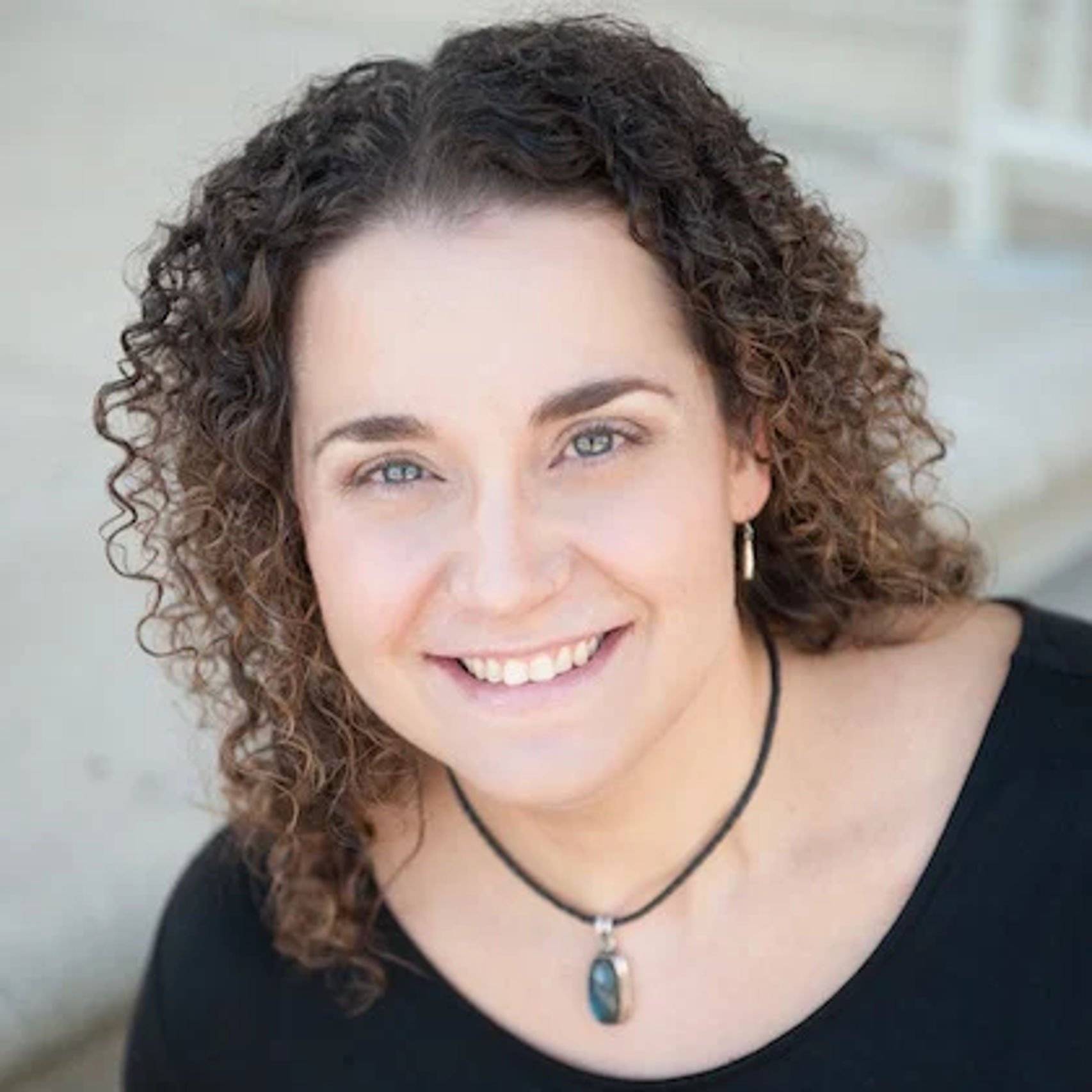 a person smiling at camera