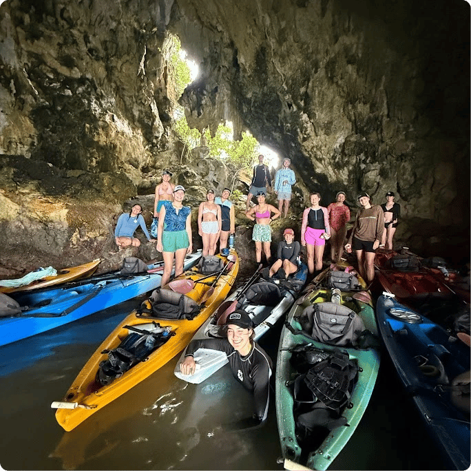 a group of people in a cave