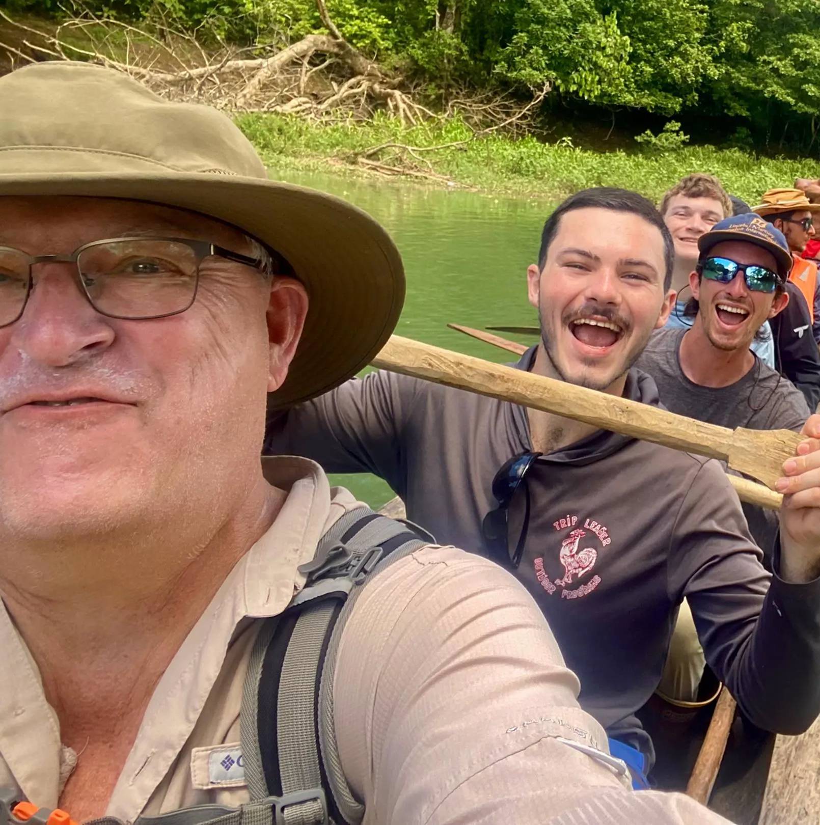a group of people in a boat