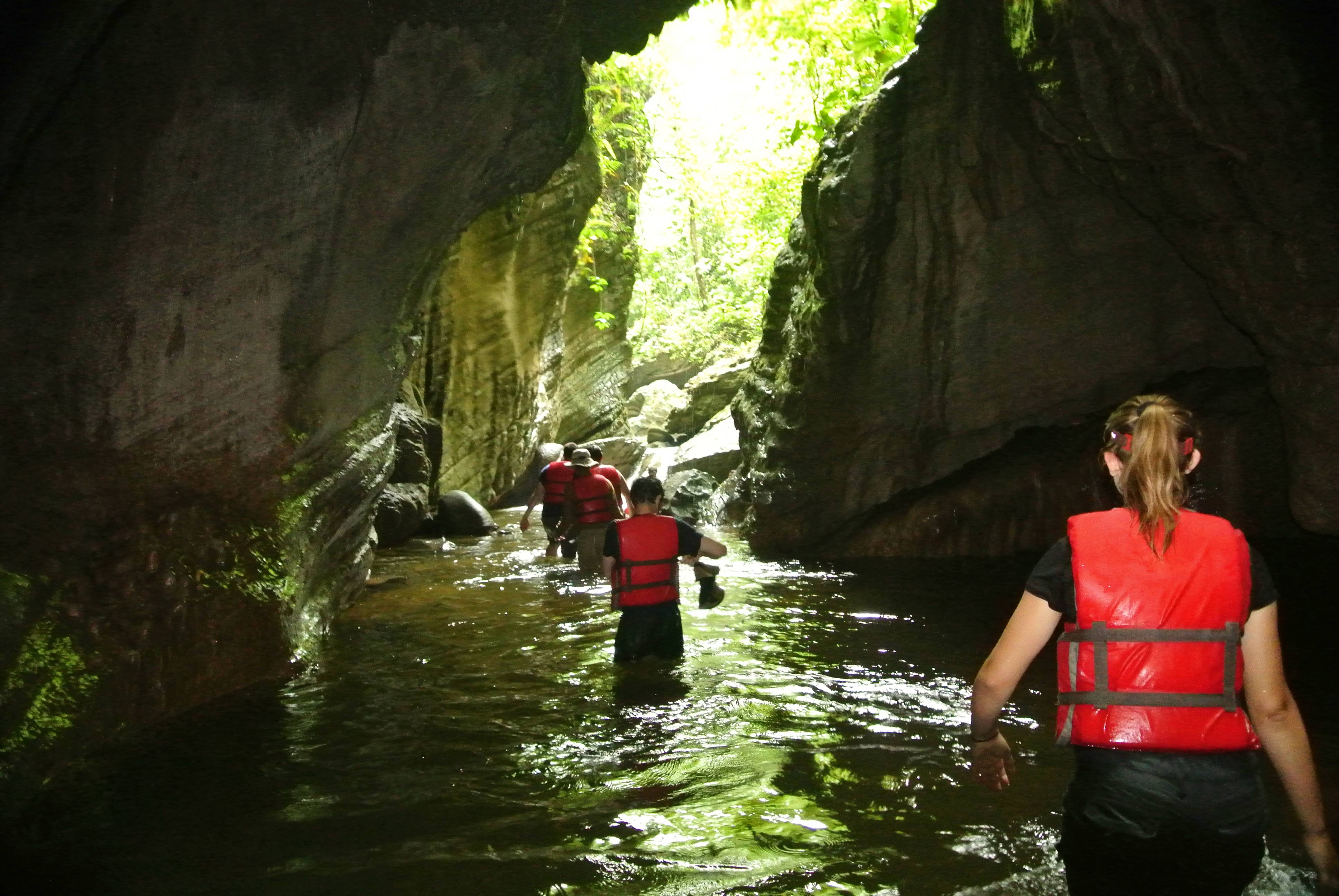 a group of people in a river