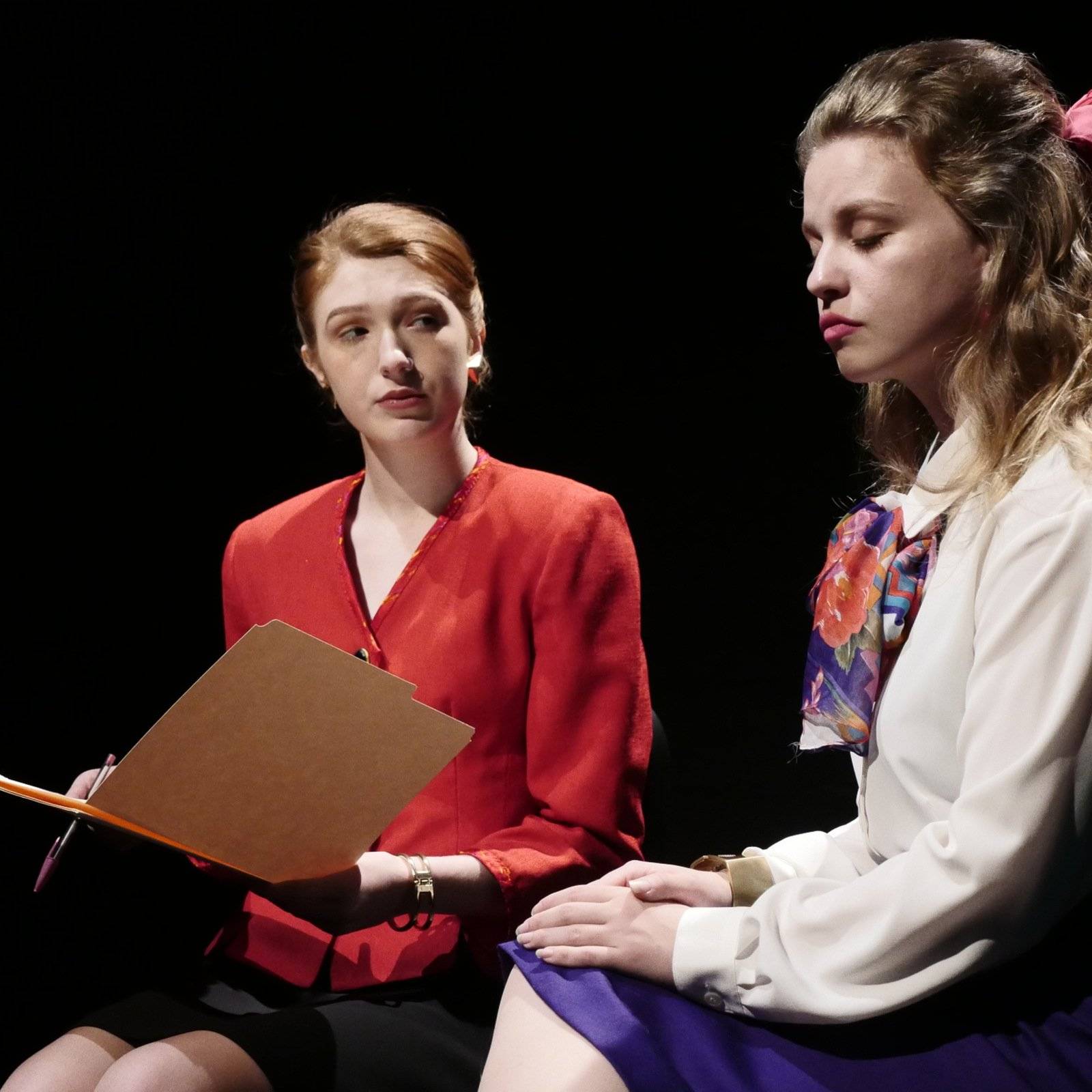 a person sitting next to another person