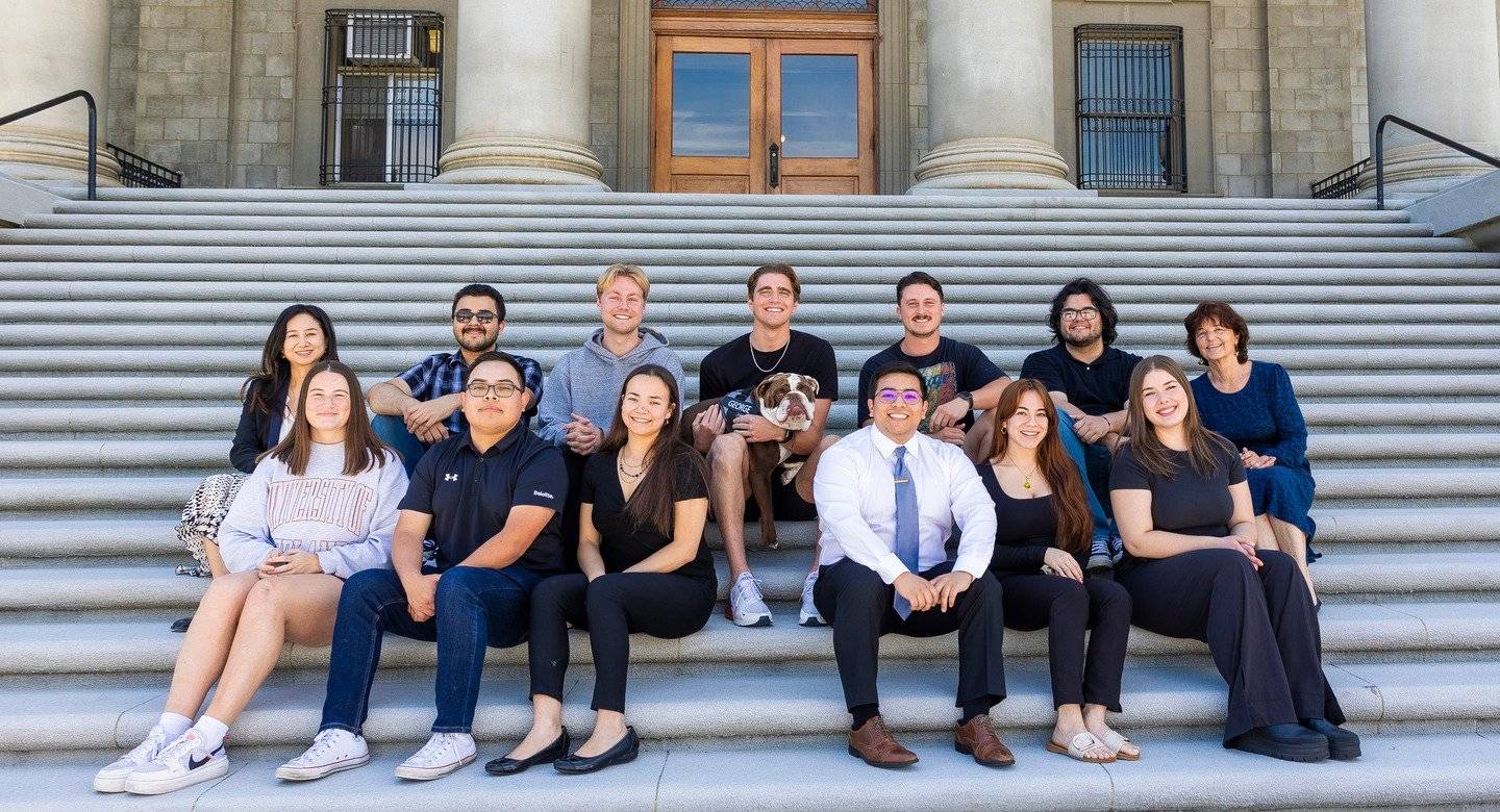 a group of people sitting on steps