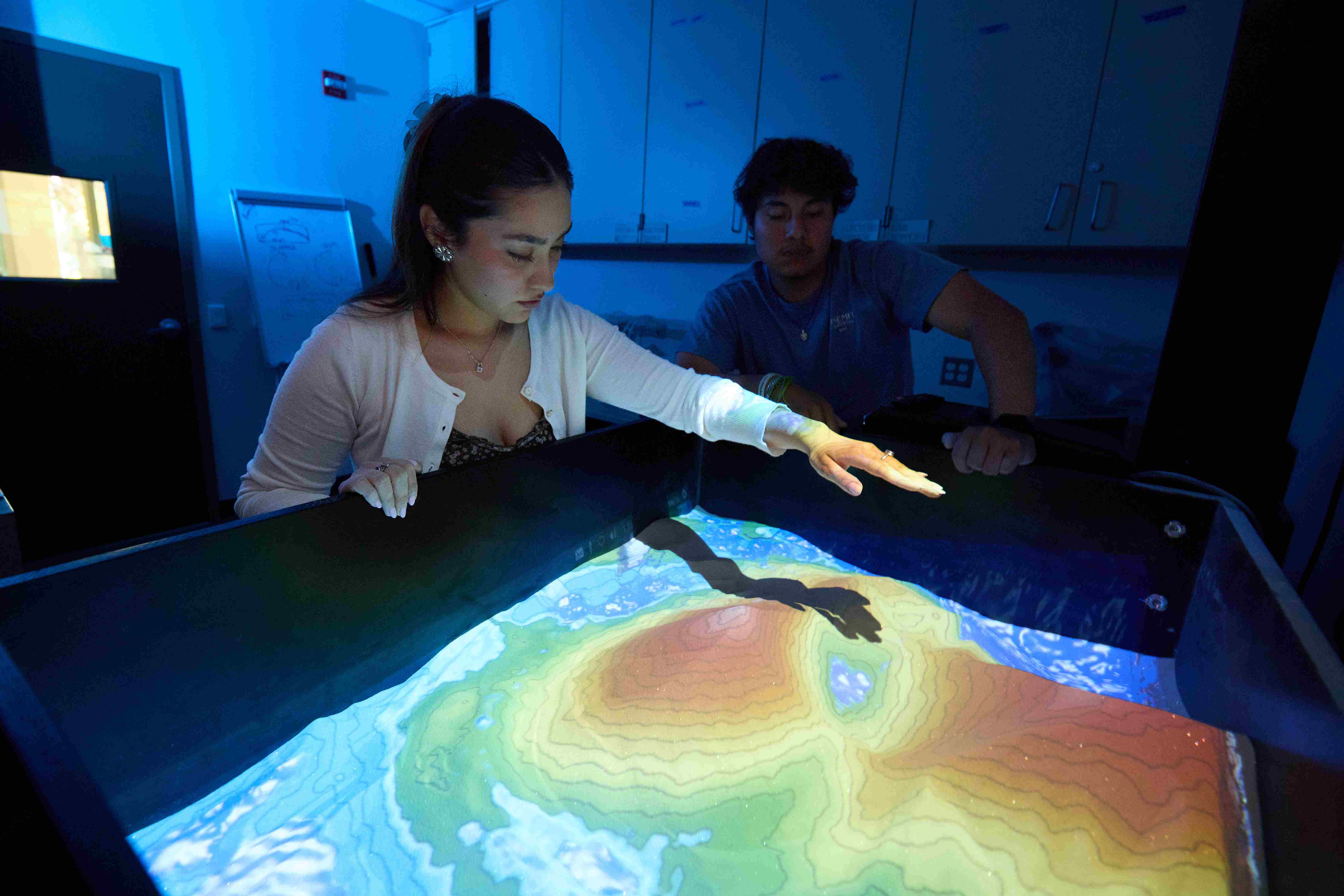 a person pointing at a map