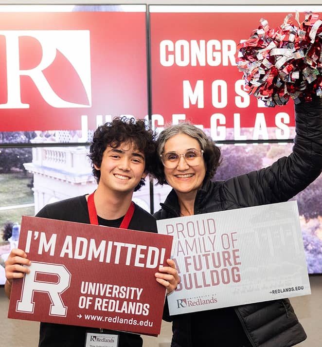 a person and person holding signs