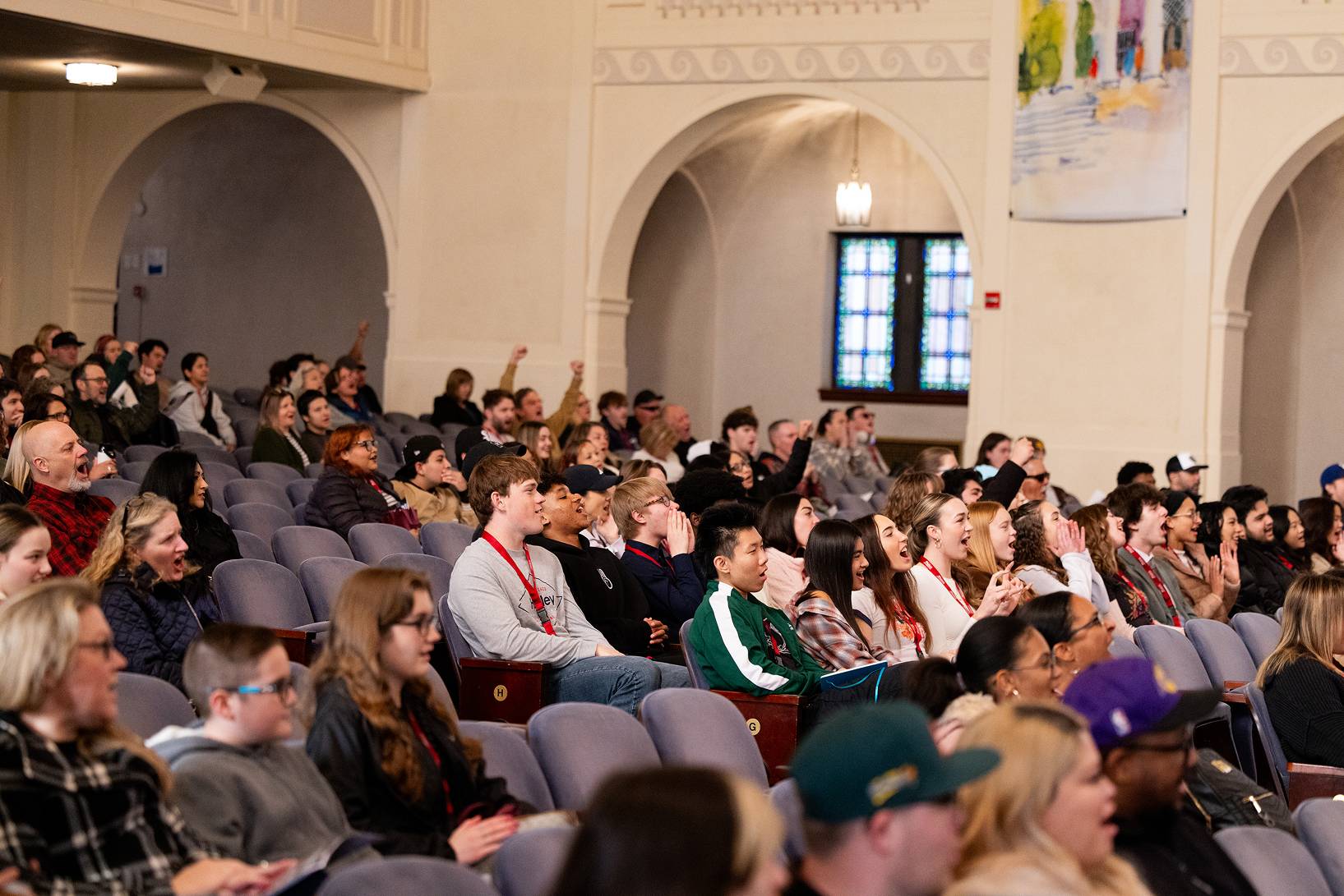 a group of people sitting in a room