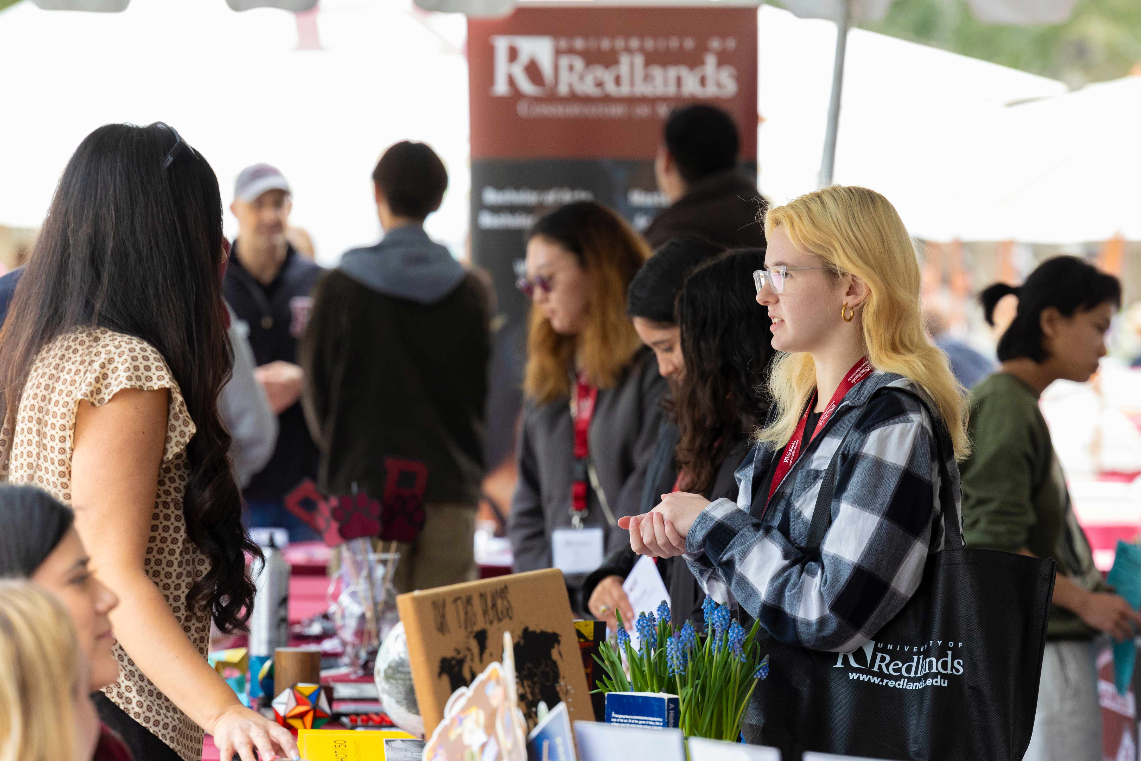 a group of people standing in a line