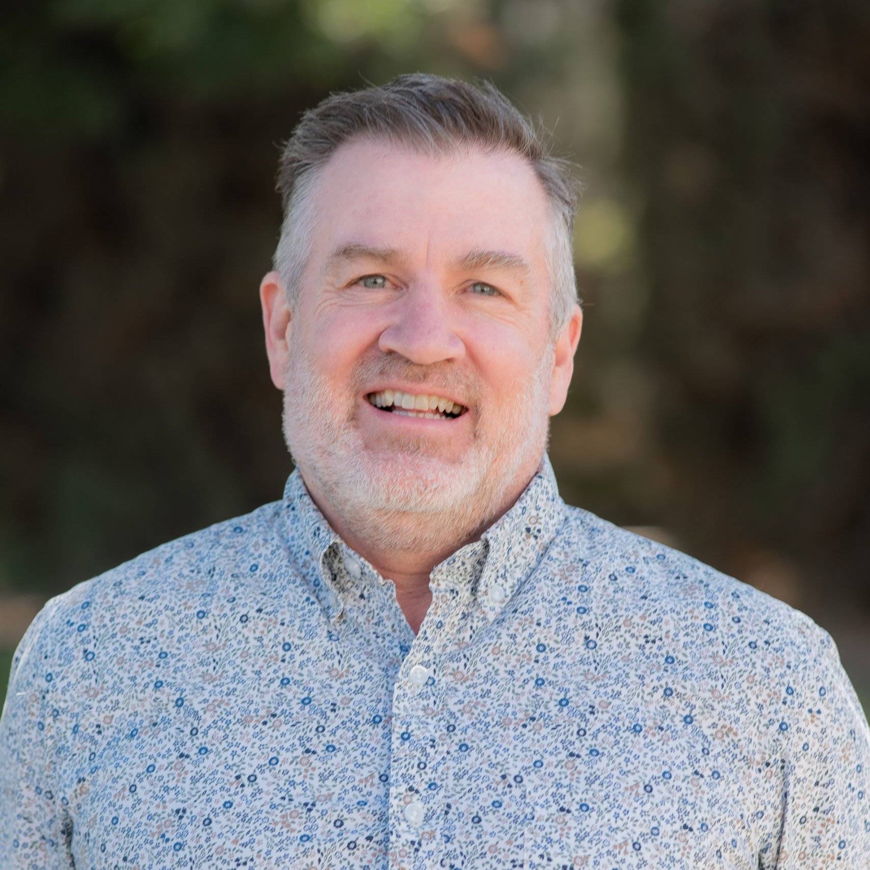 a person smiling for a picture