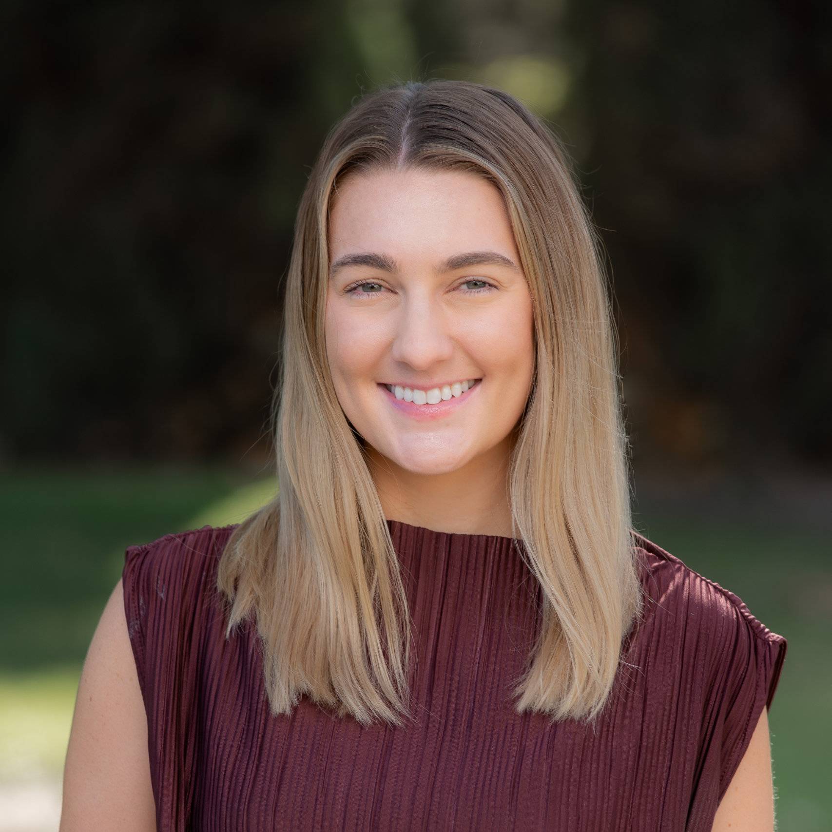 a person smiling at camera