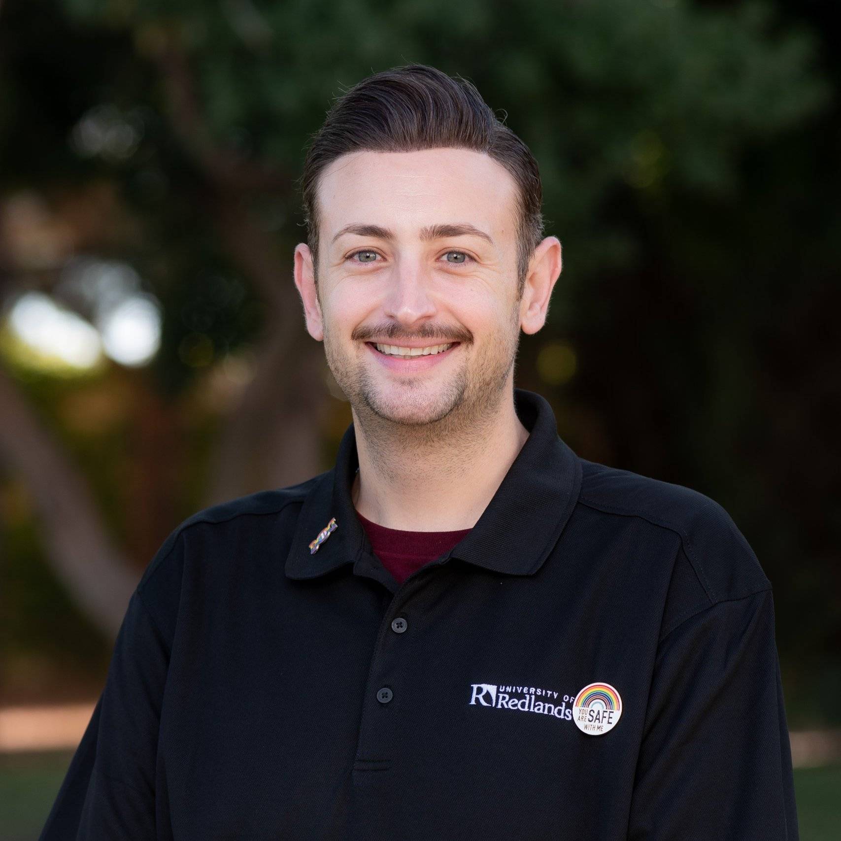 a person smiling for a picture