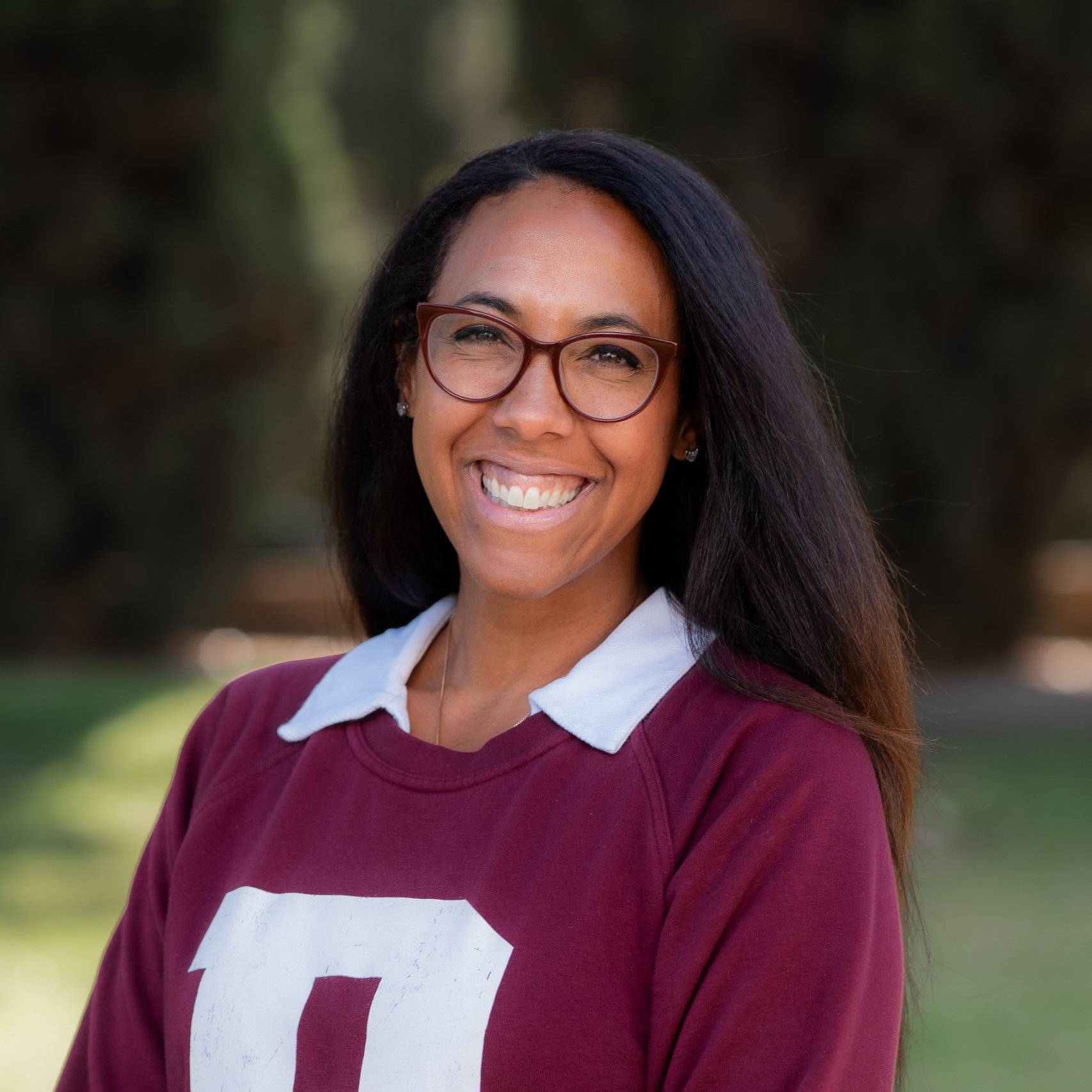a person smiling at camera