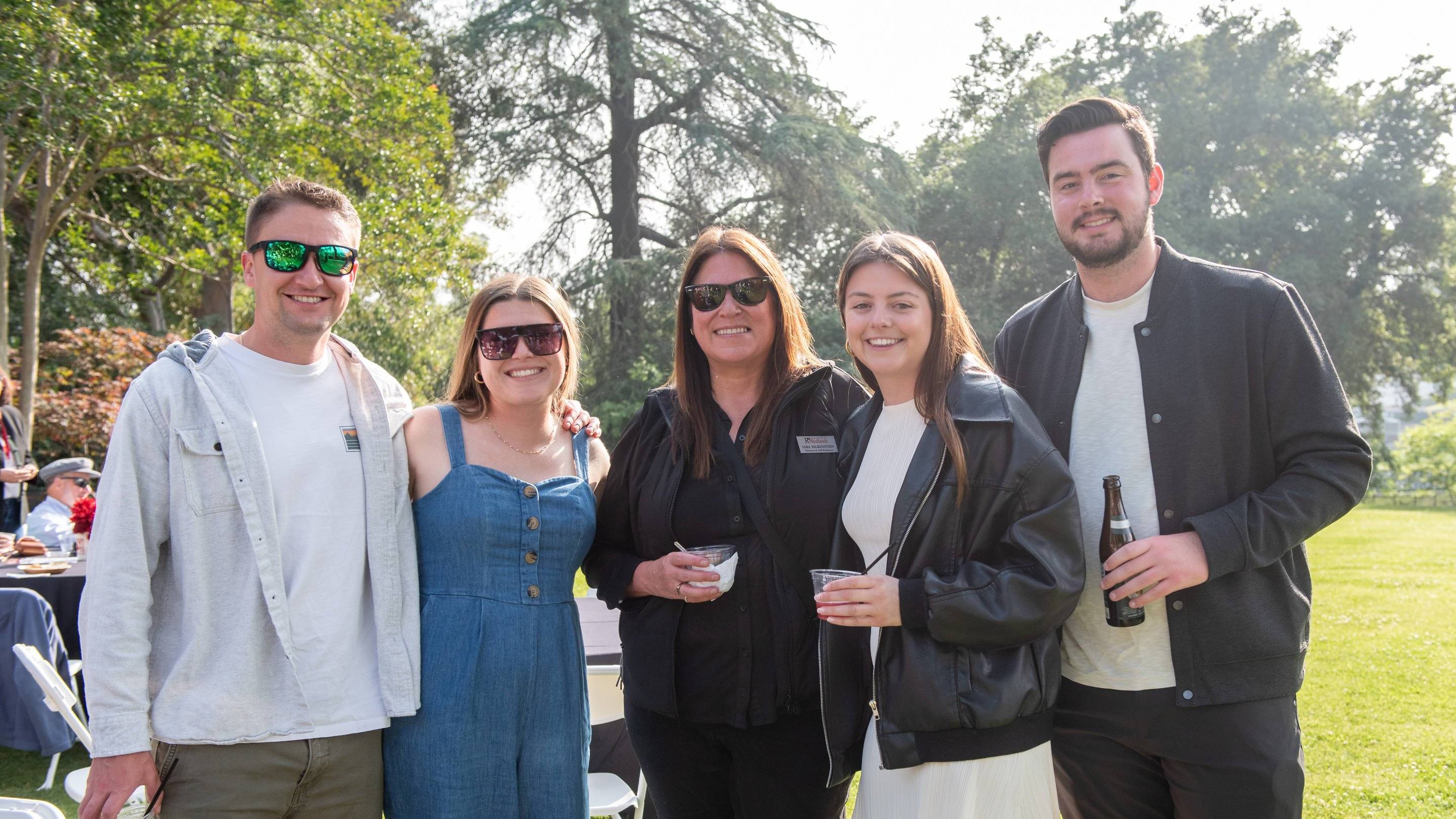 a group of people posing for a photo