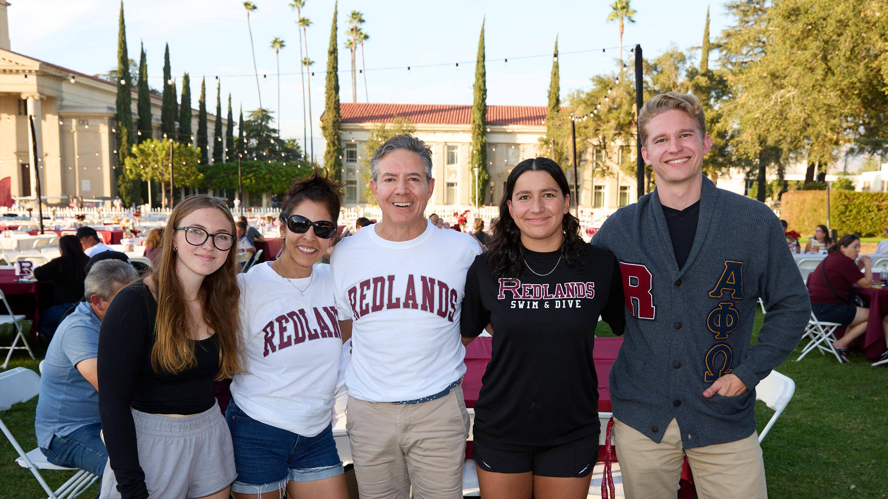 a group of people posing for a photo