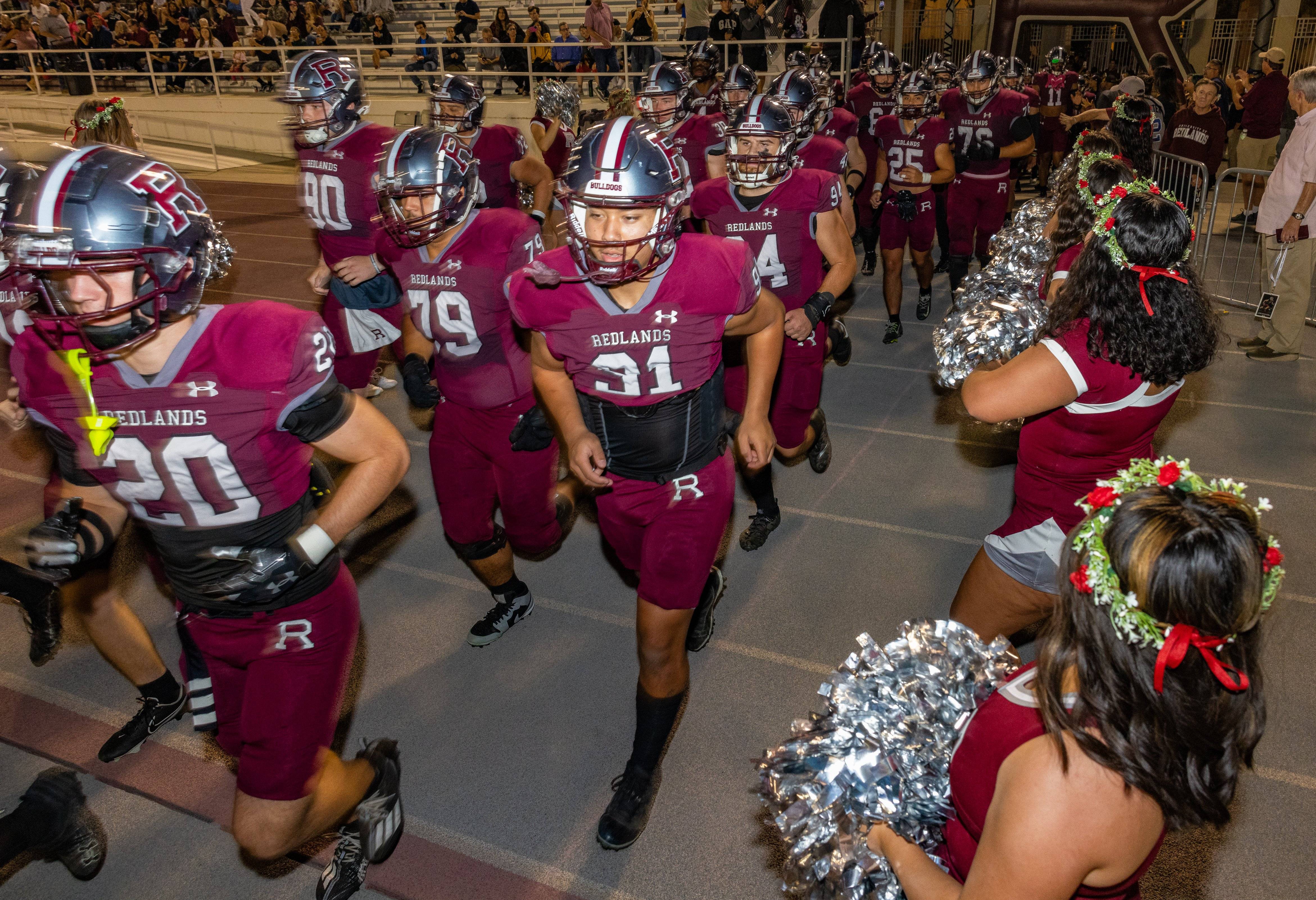 a group of football players in matching uniforms