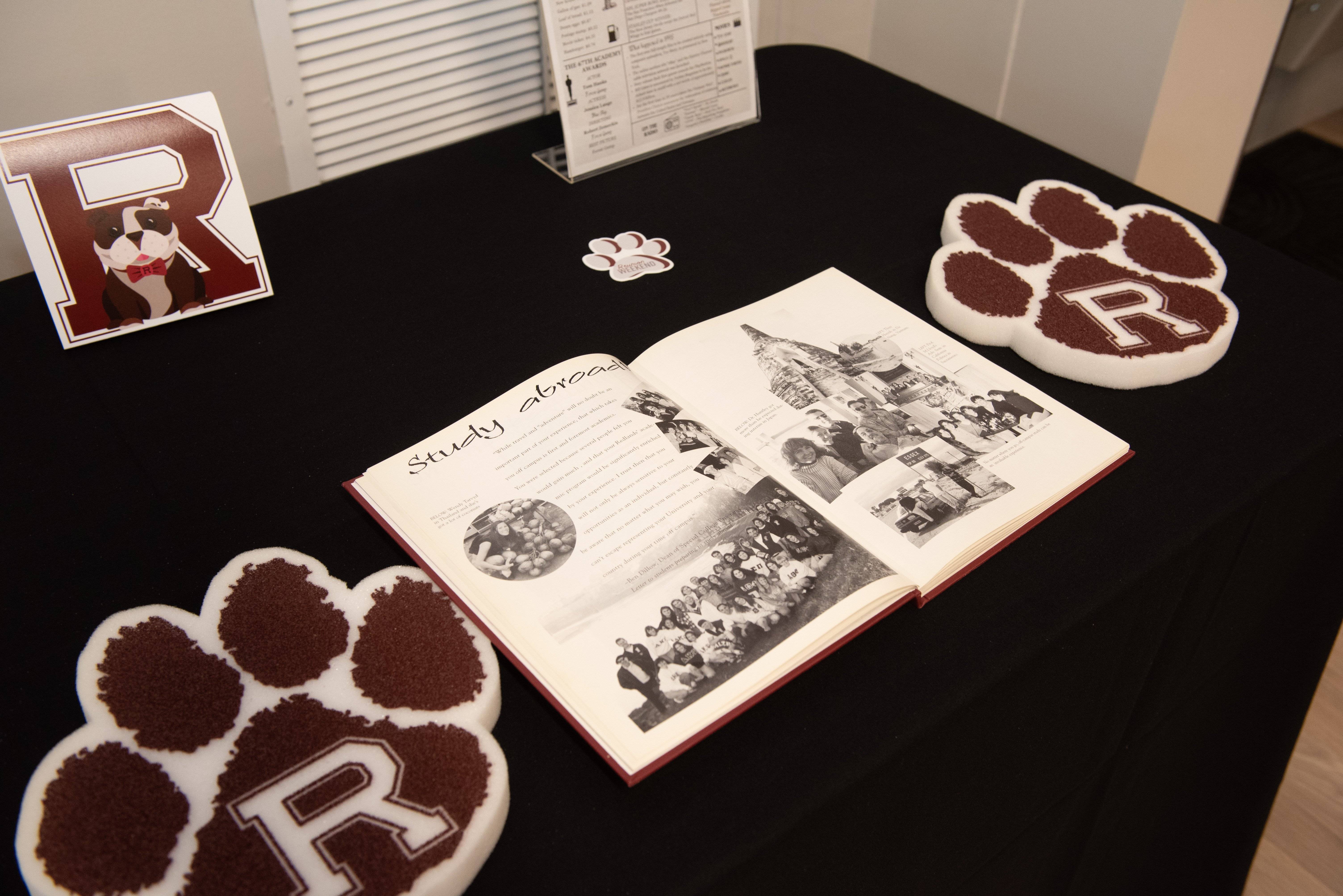 a book and paw prints on a table
