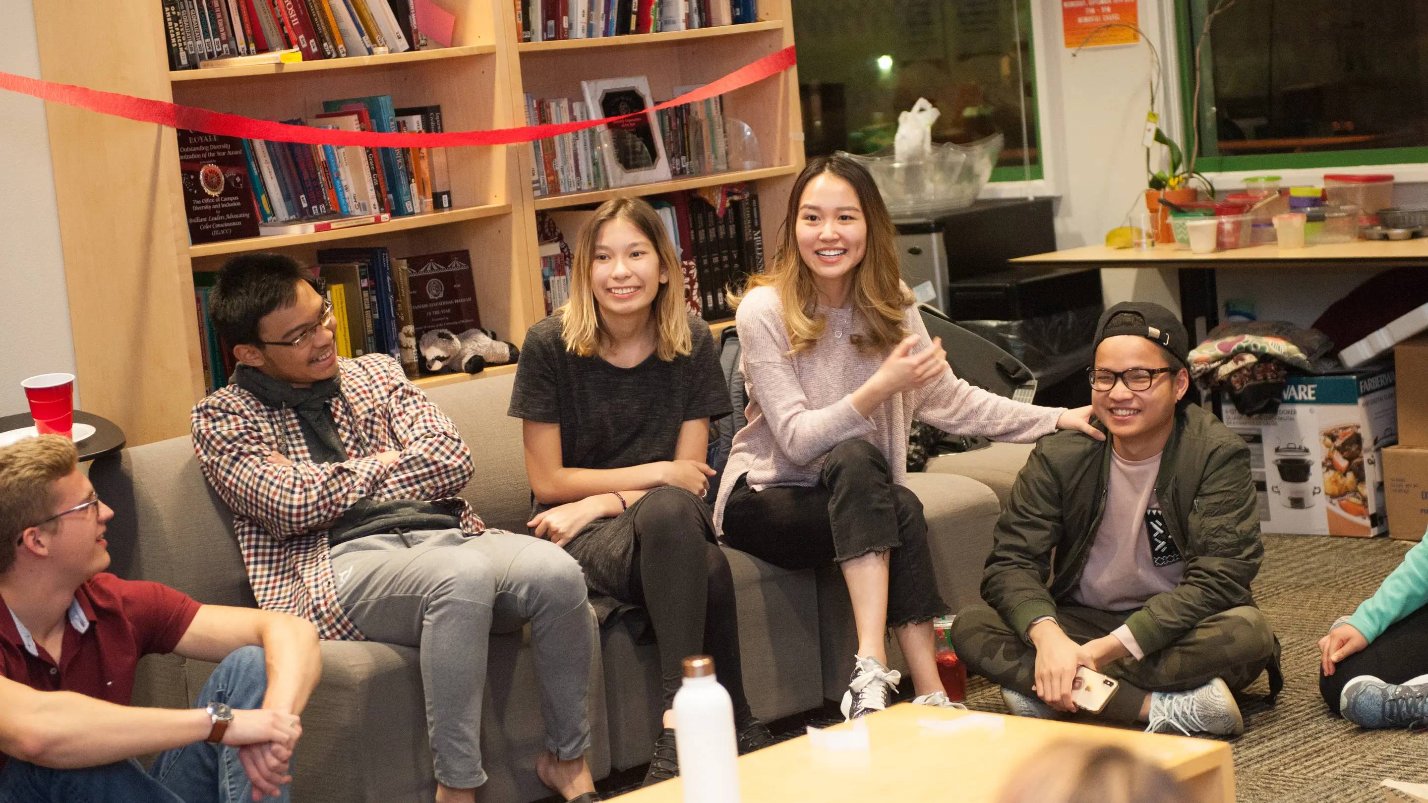 a group of people sitting on couches