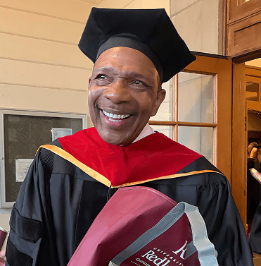 a person in a graduation gown