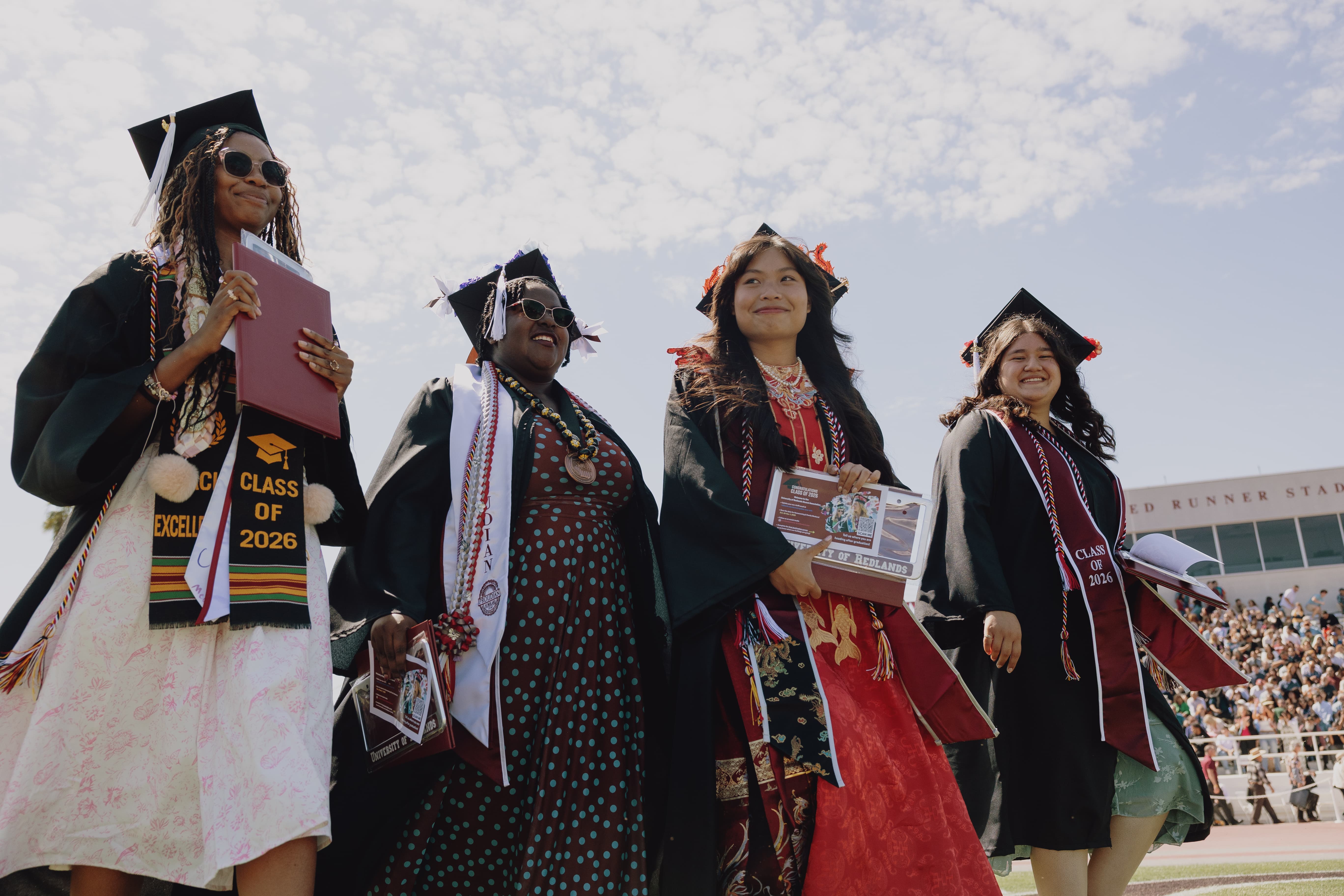 a group of people wearing graduation caps and gowns