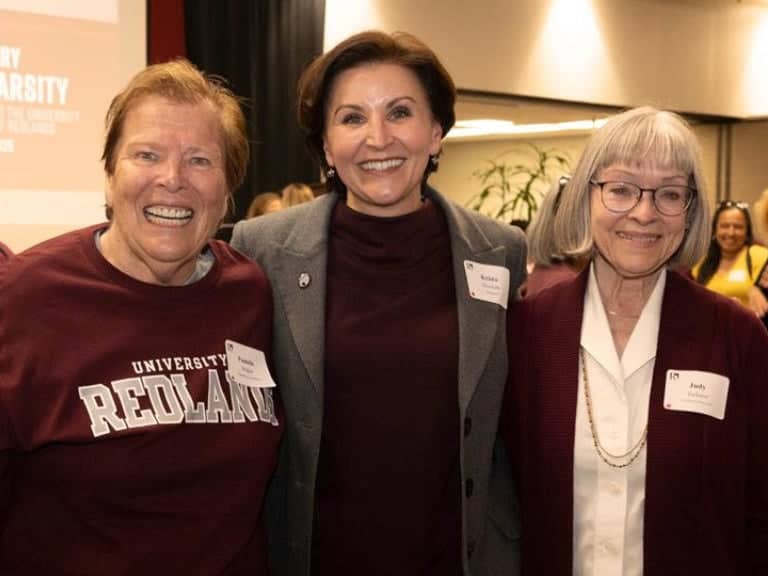 a group of women smiling