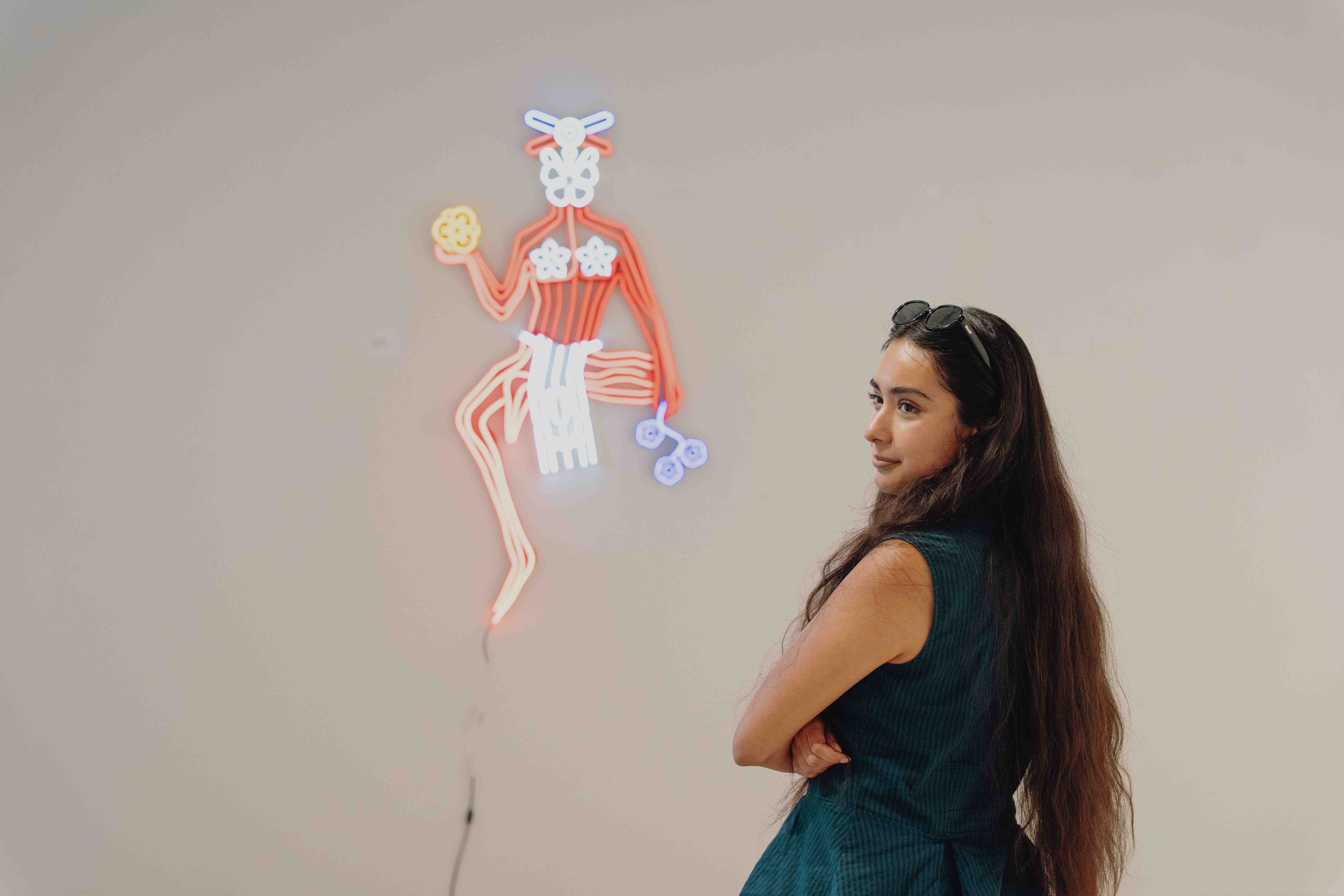 a person looking at a glowing huperson body