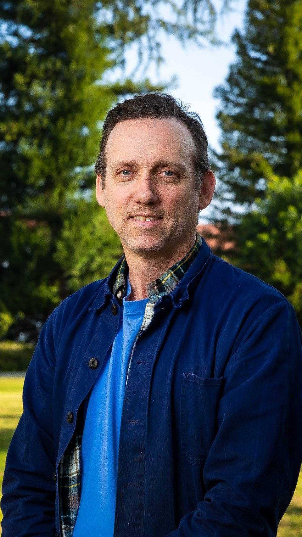 a person in a blue jacket