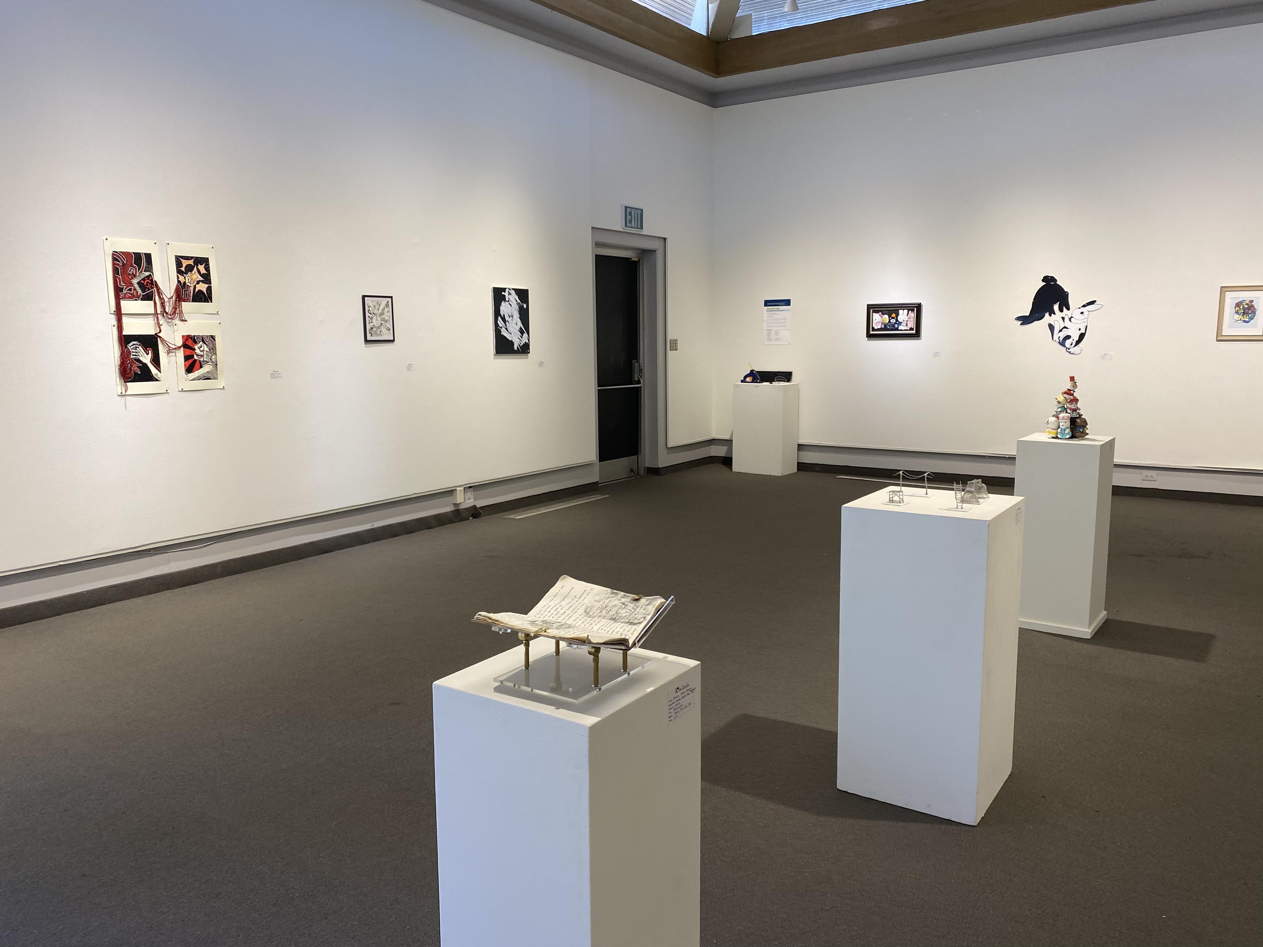 a room with art on display