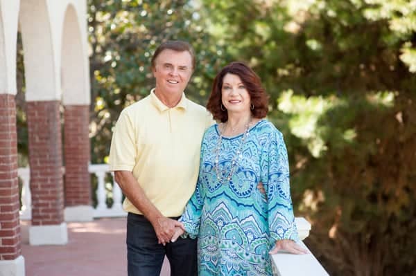 a person and person holding hands