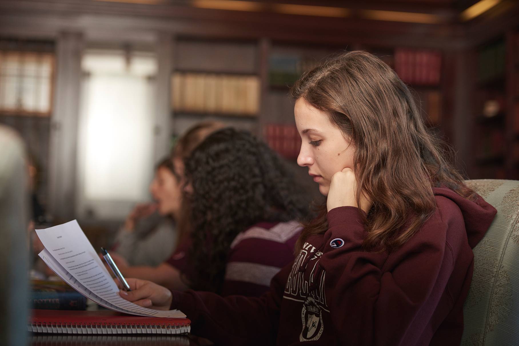 a group of students studying in a library