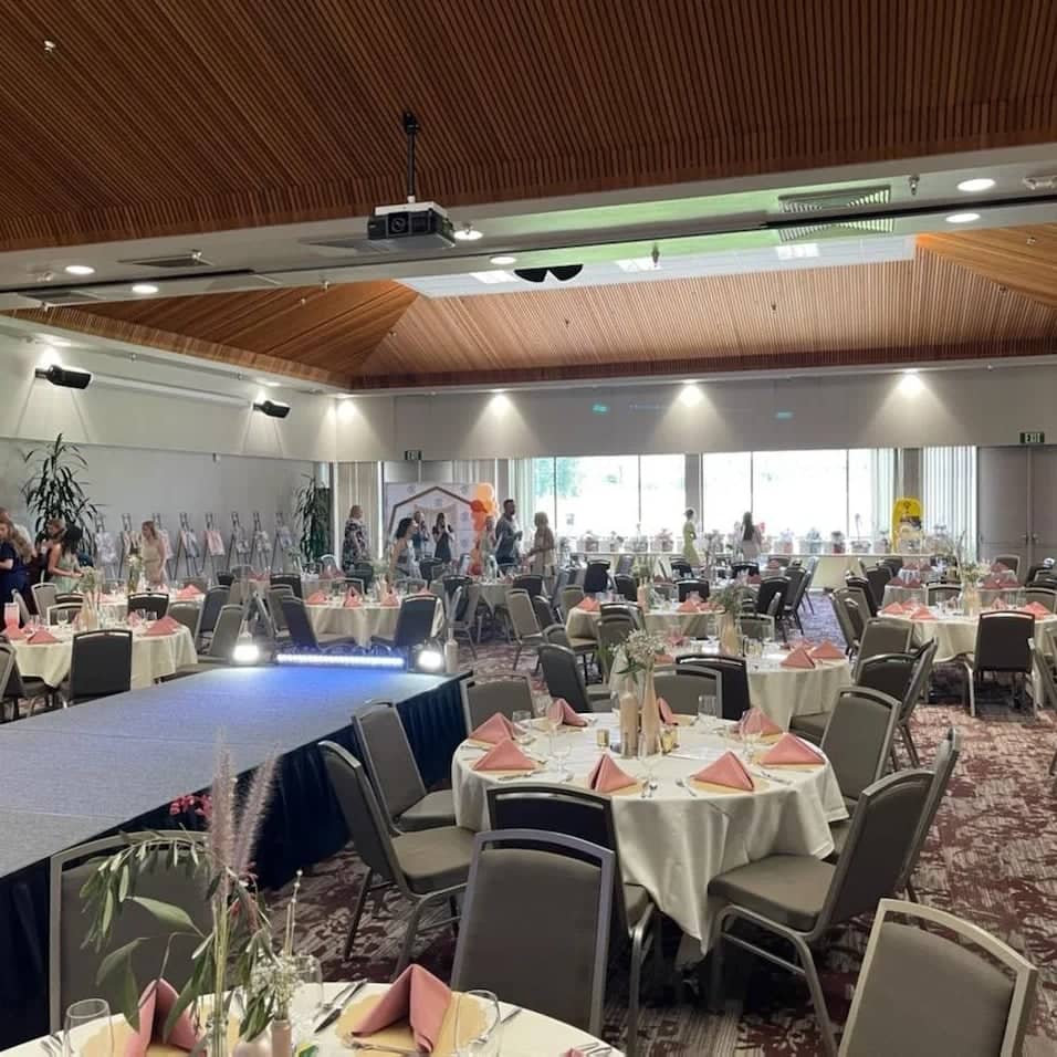 a room with tables and chairs