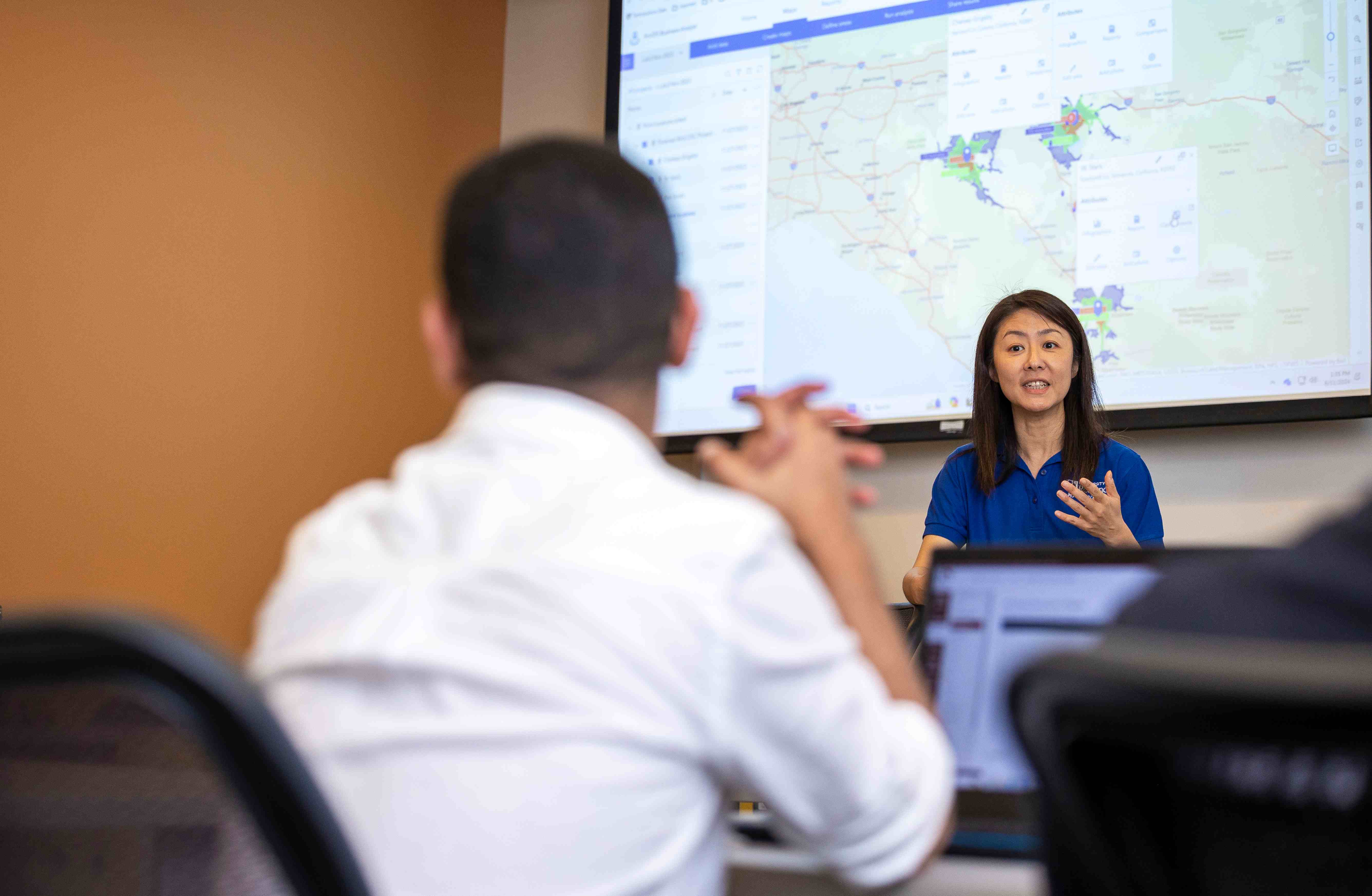 a person in front of a screen