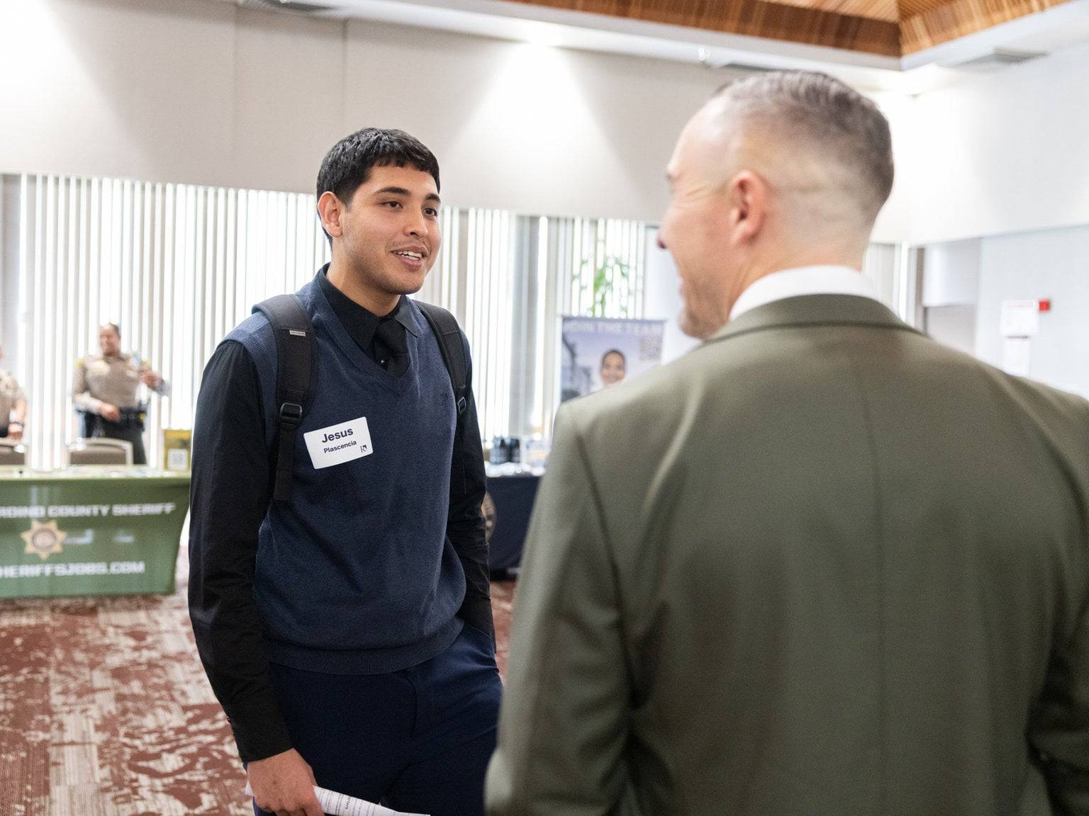 a person talking to another person