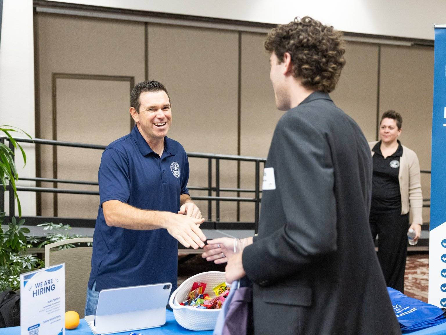 a person handing a hand to another person