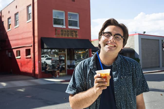 a person holding a drink