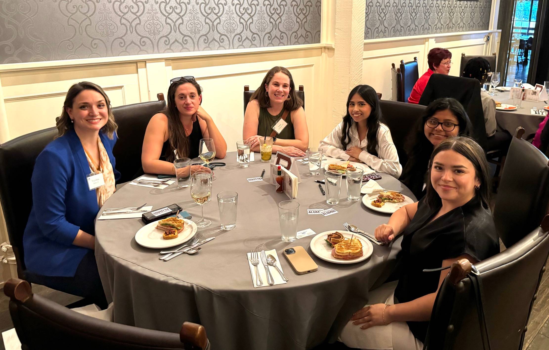 A group of students sitting at a table