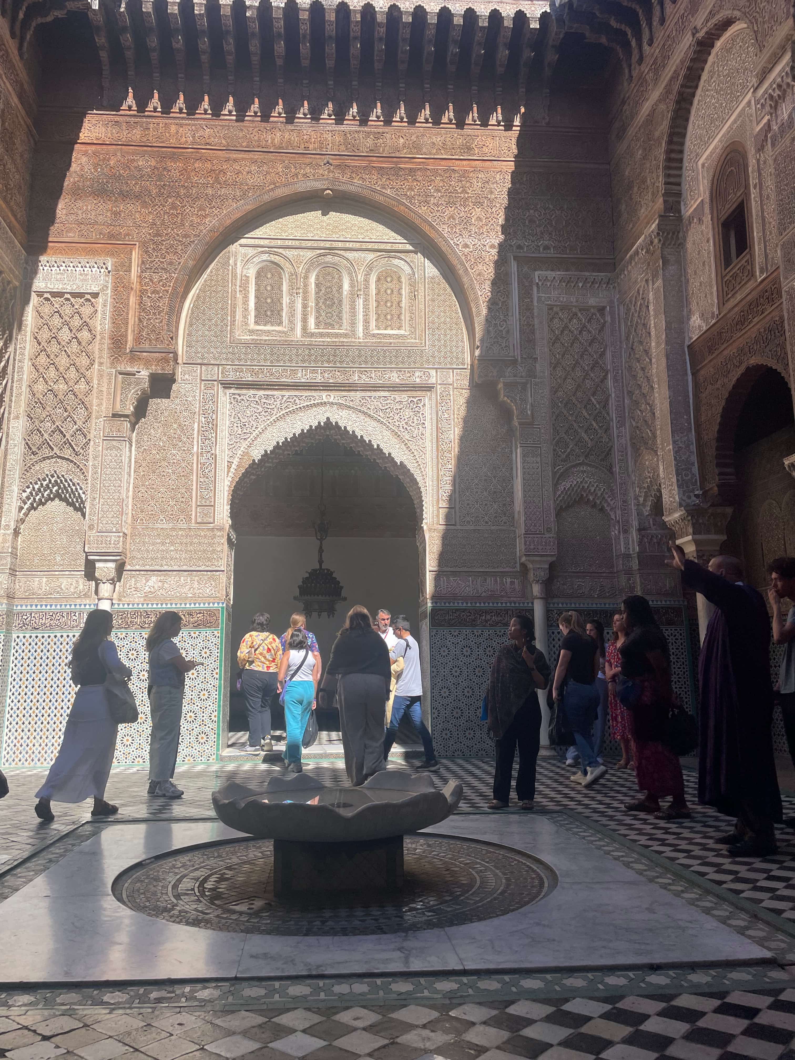 a group of people in a courtyard