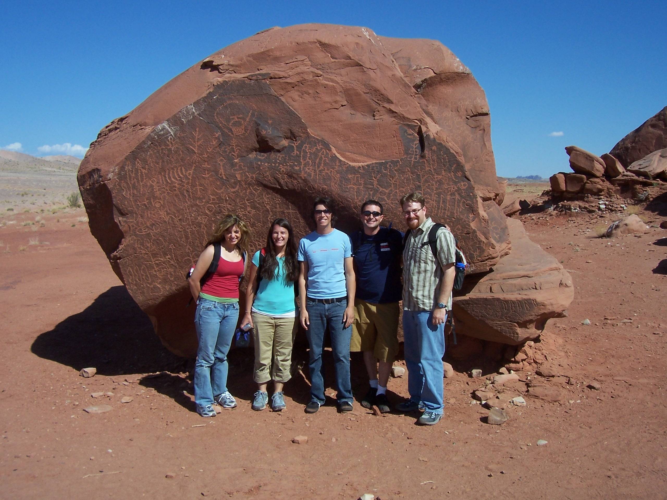 a group of people posing for a photo