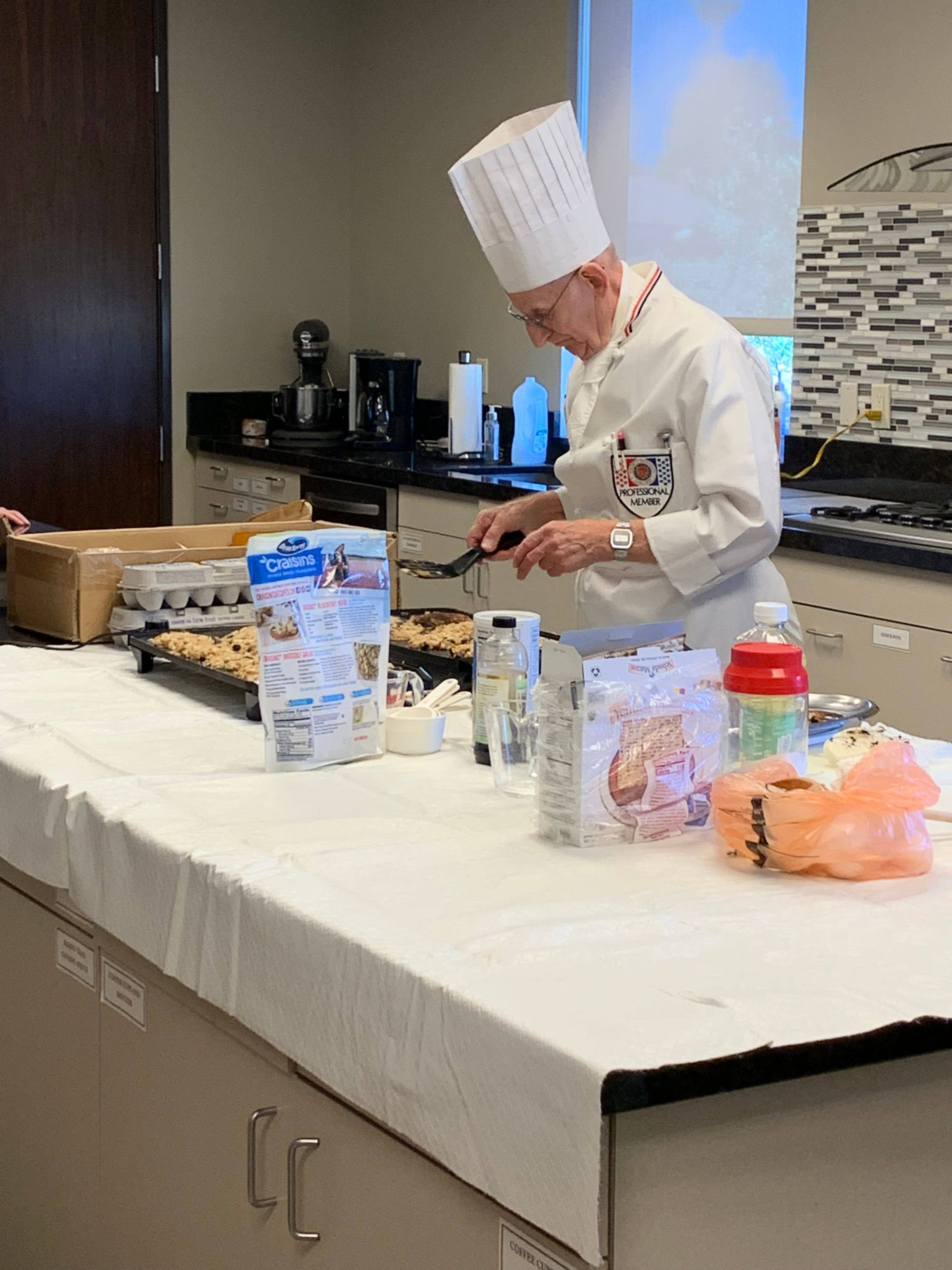 a person in a chef's hat cooking