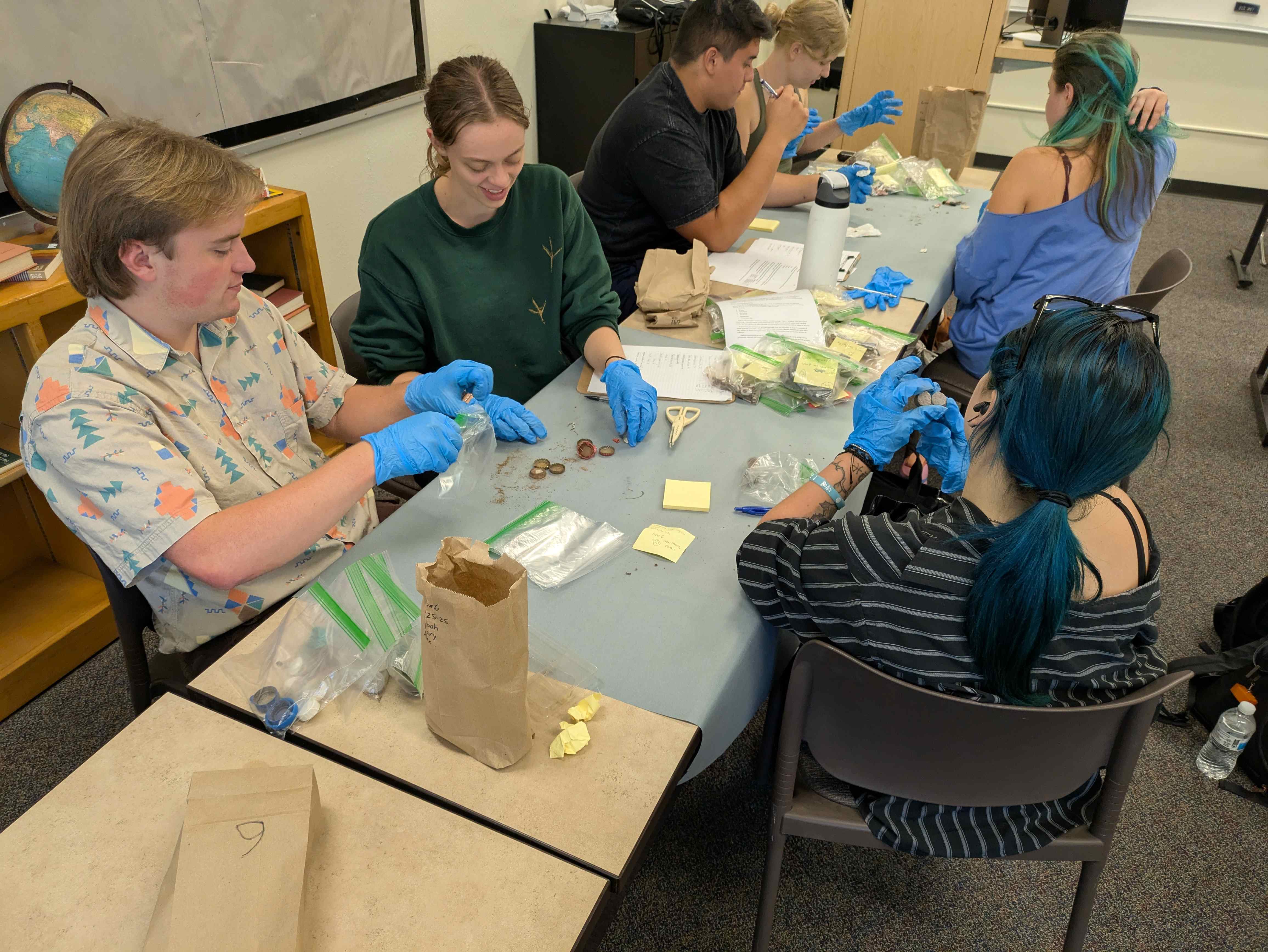 a group of people sitting at a table