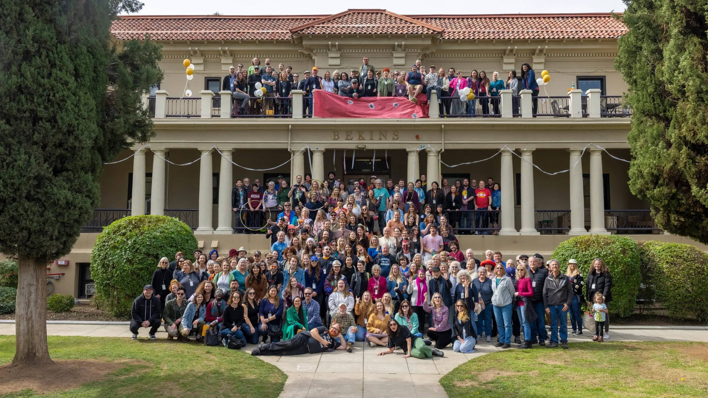 a group of people posing for a photo