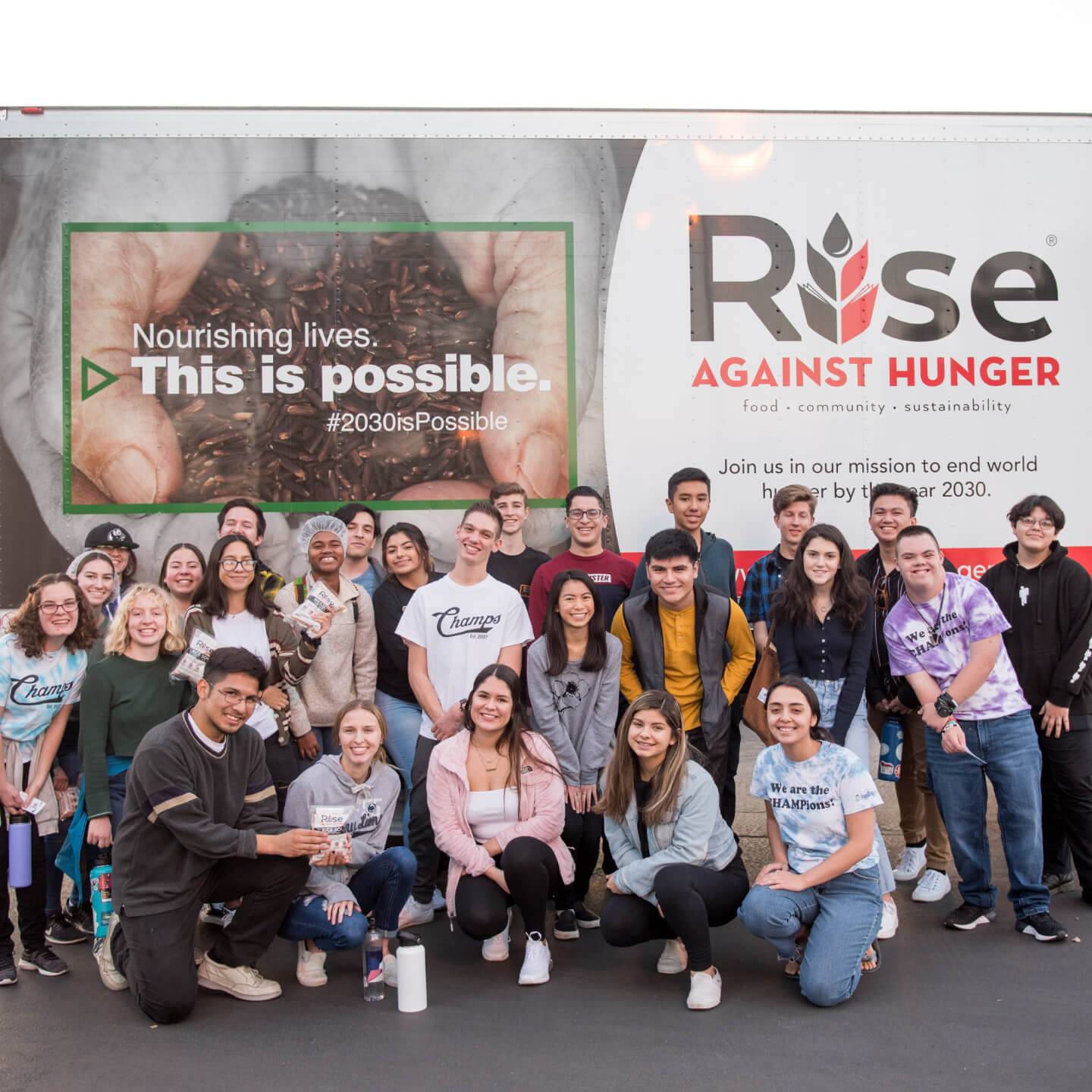 a group of people posing for a photo