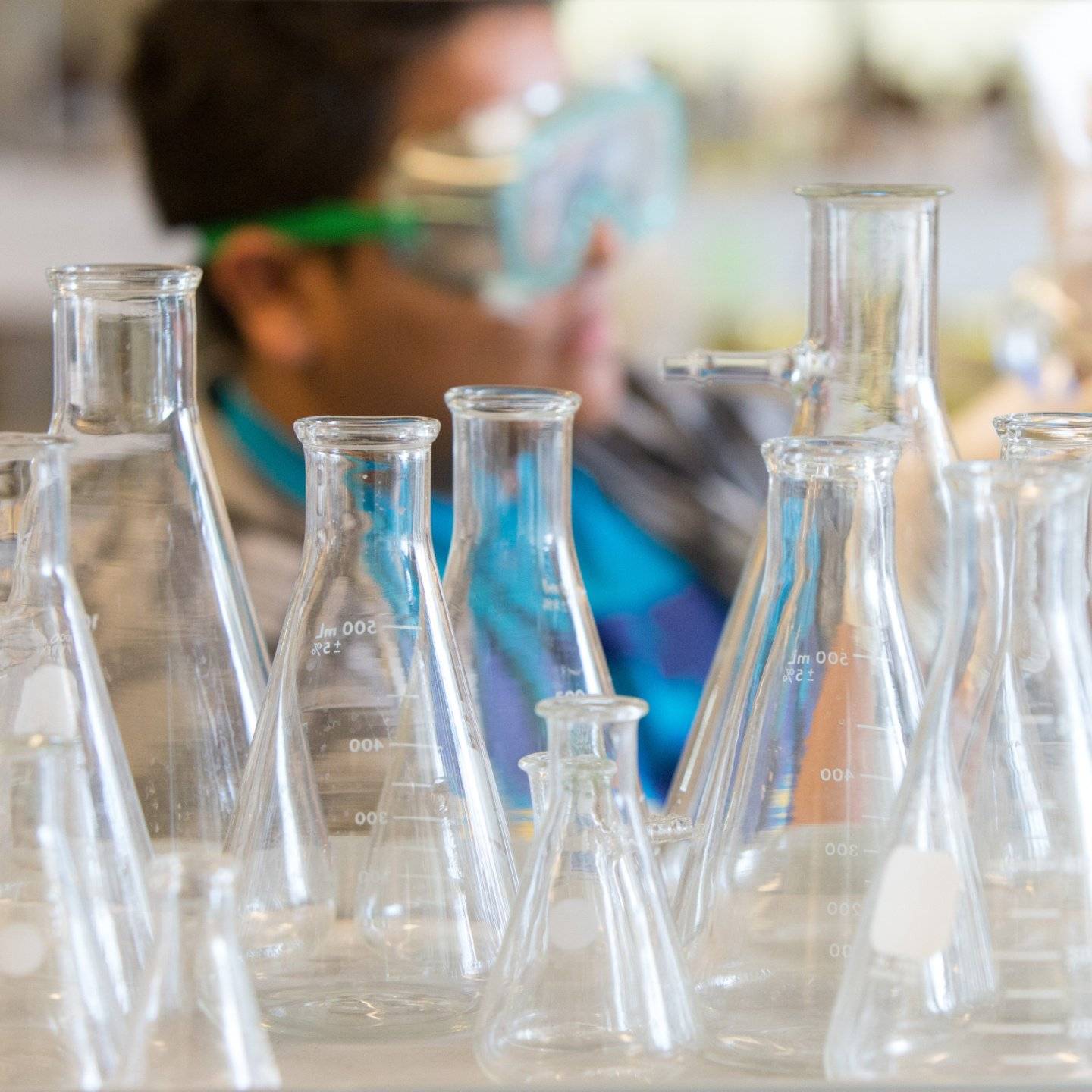 a group of glass beakers