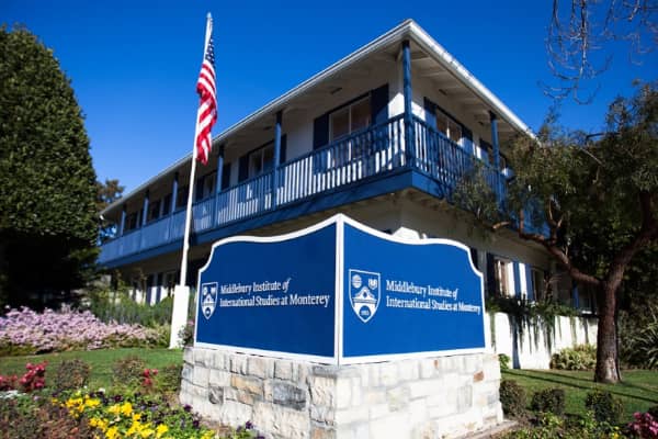 a building with a flag in front of it