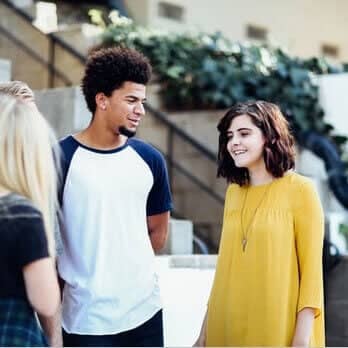 a group of people standing outside