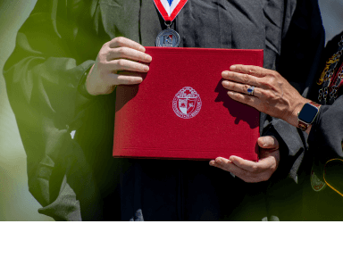 a person holding a red folder