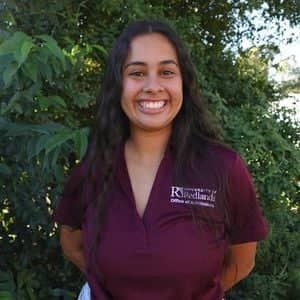 a person smiling at camera